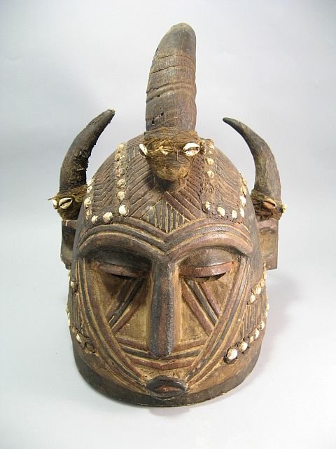 African Tribal Dogon Helmet Mask 19Th Early 20Th C.: Dance of the kings ceremonies. Carved face with rounded lower portion, decorations around forhead, horns.From Phila collection. Most antiques in the collection were purchased at Freeman's, and some fr