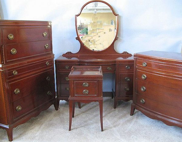 Mahogany Duncan Phyfe Style Bedroom Set: 7 Piece set including full size bed, a high chest, dresser, vanity with mirror, night stand and hanging mirror. High chest, H.52" x W.37" x Deep.18". Dresser H.36" x W.37" x Deep.23". Vanity w/ mirror
