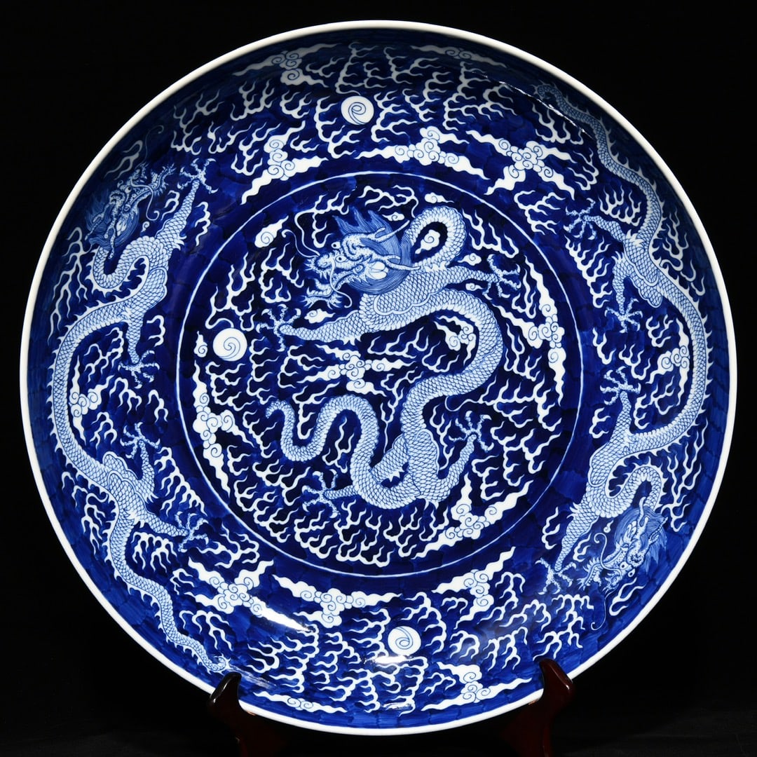 An exquisite chinese blue and white five dragon dish: Size: Width 49.6 cm - Height 8.8 cm |Materials: Porcelain |Style Dynasty: Qing dynasty |Attributed: Chuxiugong Mark |Object: Chinese Antique