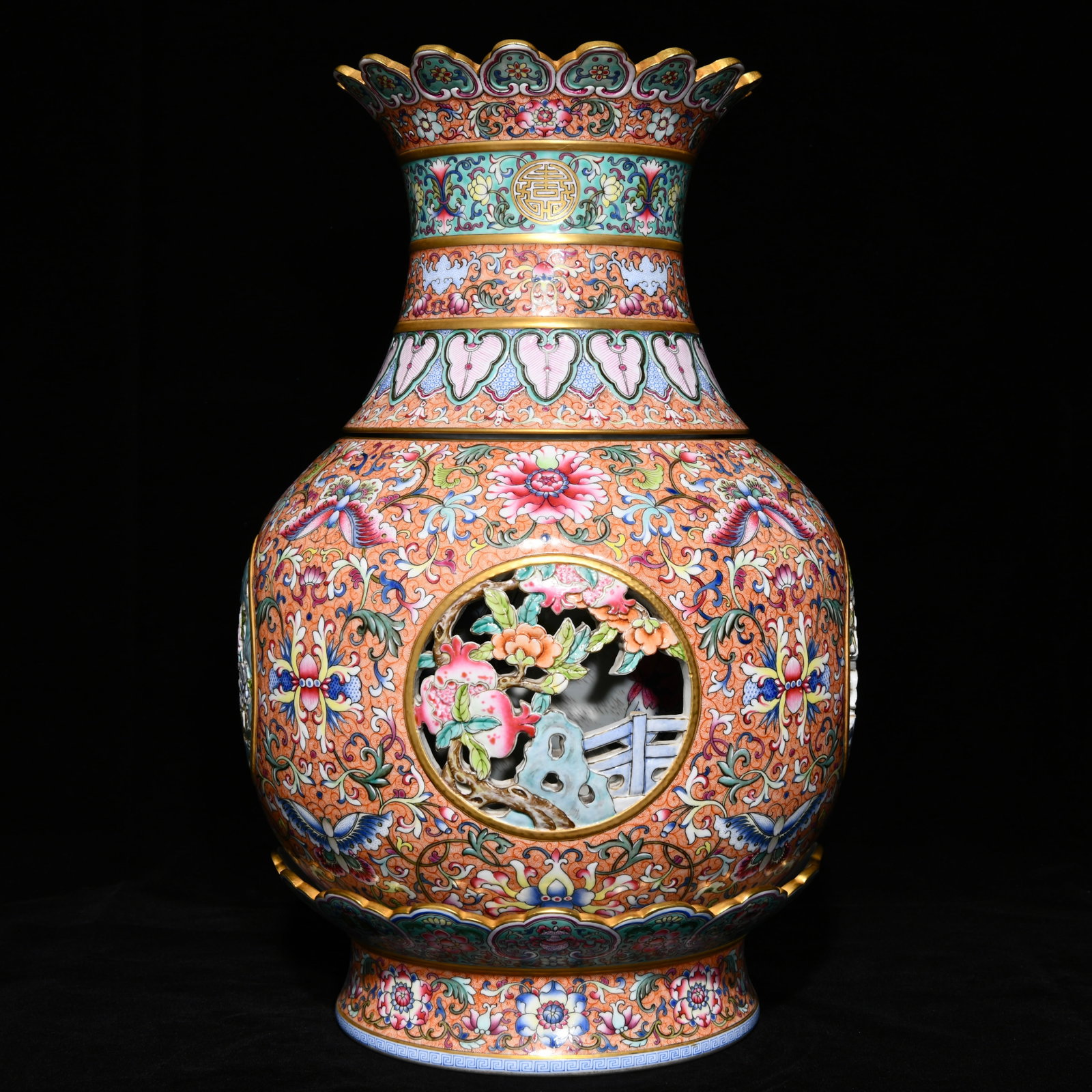 An exquisite chinese enamel and gilt phoenix-tailed meadow saucer pattern hollow revolving vase: Size: Height 40.5 cm - Width 27 cm |Materials: Porcelain |Style Dynasty: Qing dynasty |Attributed: Qianlong Mark |Object: Chinese Antique