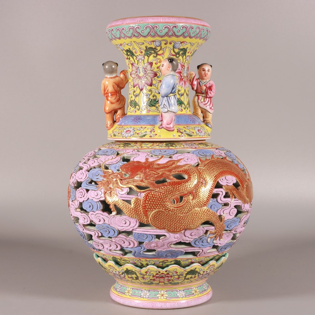 An Exquisite Chinese enamel-colored carved hollow dragon pattern revolving vase: Size: Height 27 cm - Width 21 cm |Materials: Porcelain |Style Dynasty: Qing dynasty |Attributed: qianlong Mark |Object: Chinese Antique