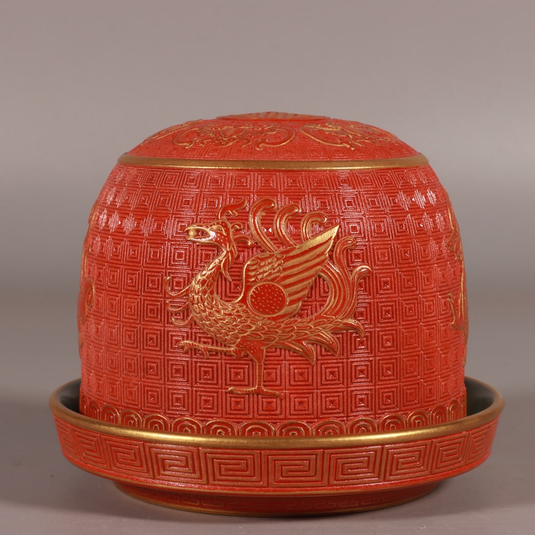 An Exquisite Chinese alum red gold engraved dice cup with four mythical beasts (1 of 9)