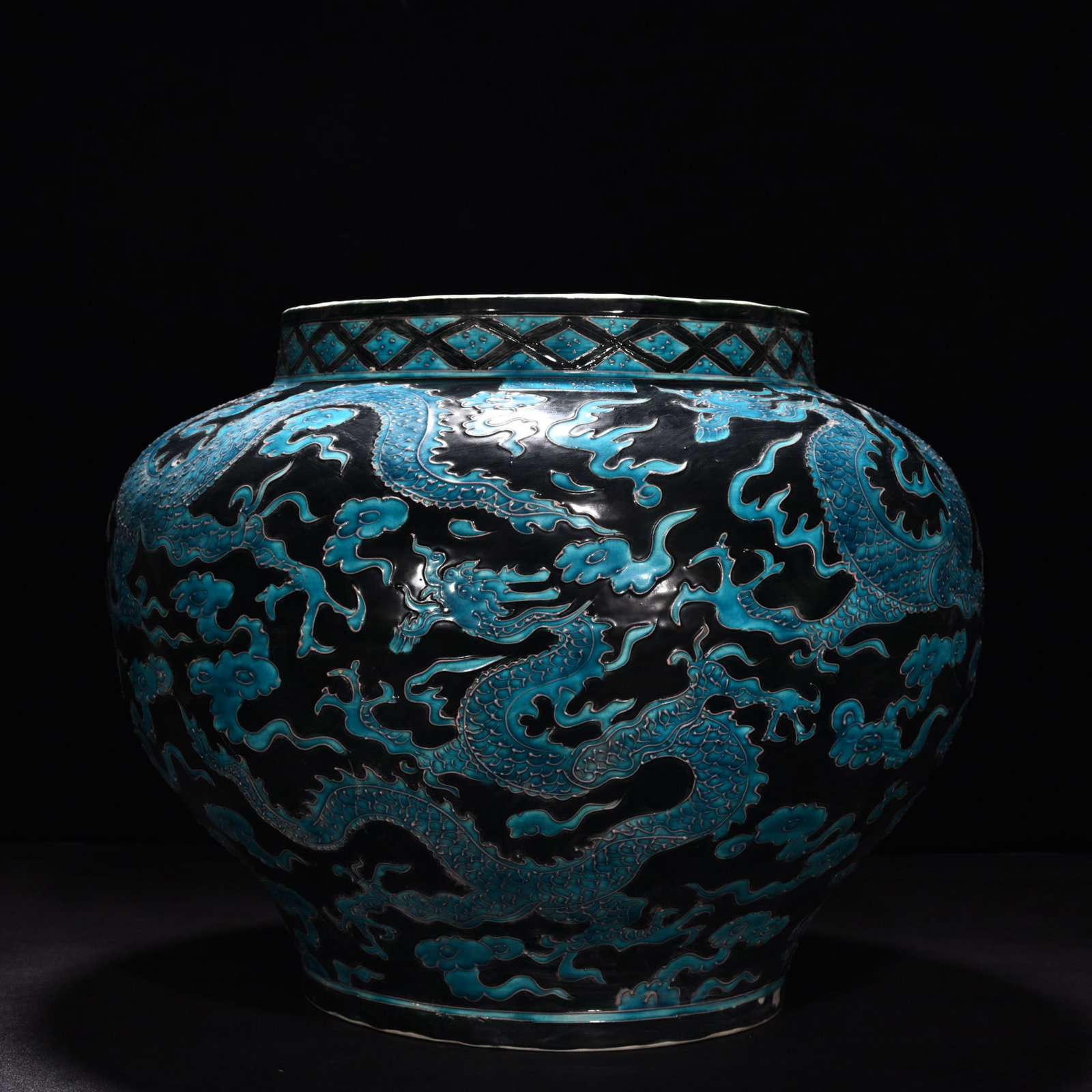 An Exquisite Chinese enamel black ground peacock blue glaze jar: Size: Height 30.5 cm - Diameter 37 cm |Materials: Porcelain |Style Dynasty: Ming Dynasty |Attributed: Yongle |Object: jar