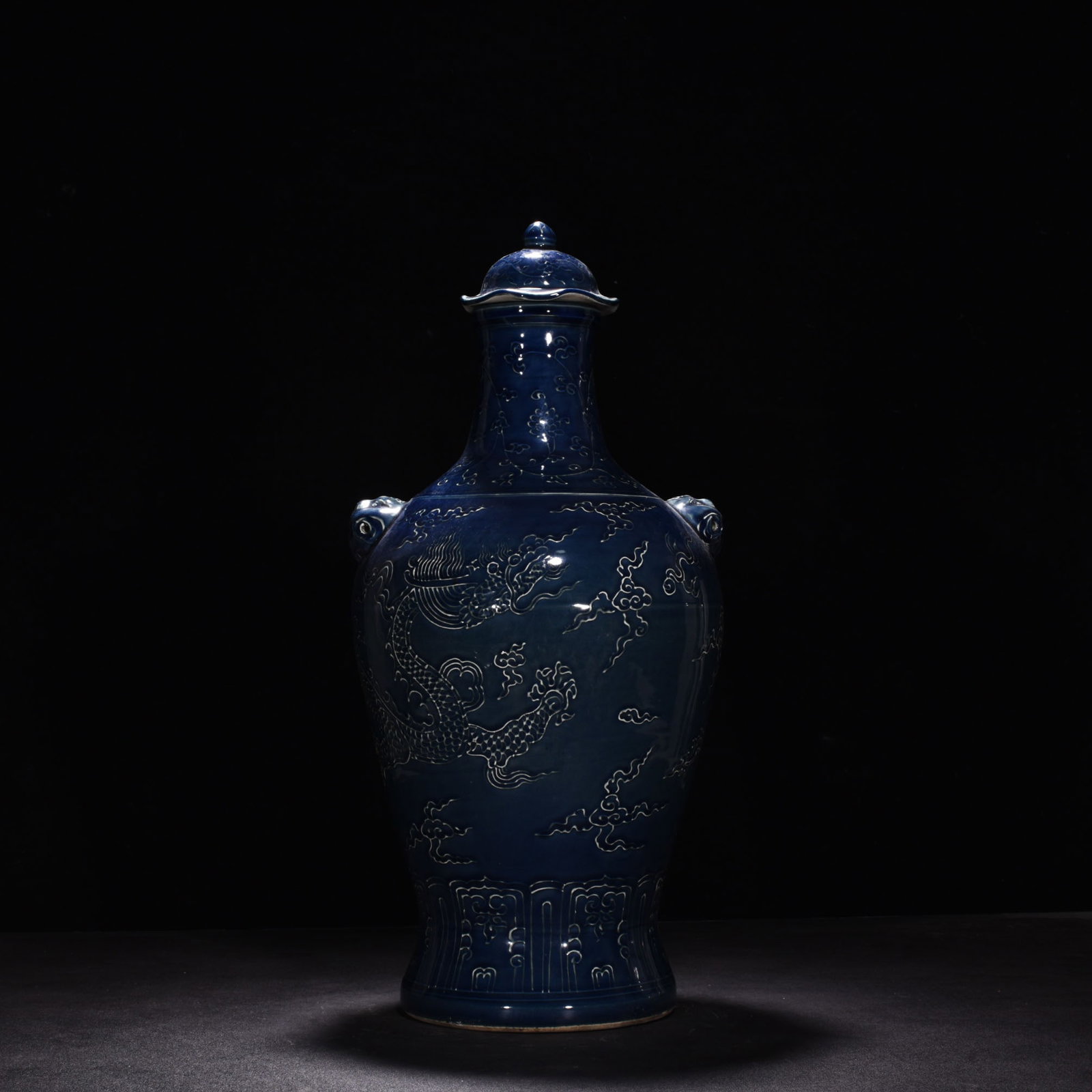 An Exquisite Chinese Ji blue glaze dragon pattern capped bottle: Size: Height 54 cm - Diameter 25 cm |Materials: Porcelain |Style Dynasty: Ming Dynasty |Attributed: Yongle |Object: bottle