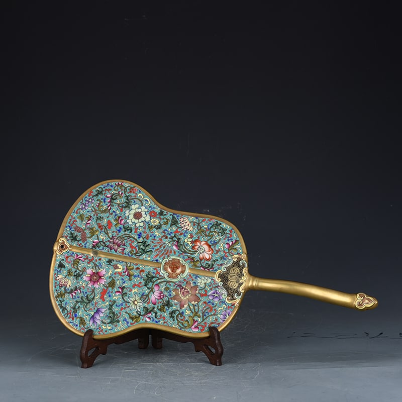 An Exquisite Chinese turquoise green ground enamel flower pattern fan antique: Size: Height 44 cm - Width 23 cm |Materials: Porcelain |Style Dynasty: Qing dynasty |Inscription: Qianlong Mark |Object: Antique fan
