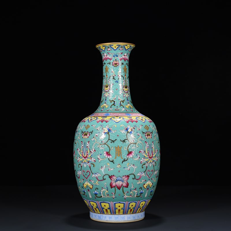 An Exquisite Chinese Turquoise Green Land Rolled Pastel Flower Pattern Vase: Size: Height 37 cm - Width 15 cm |Materials: Porcelain |Style Dynasty: Qing dynasty |Inscription: Qianlong Mark |Object: flower vase