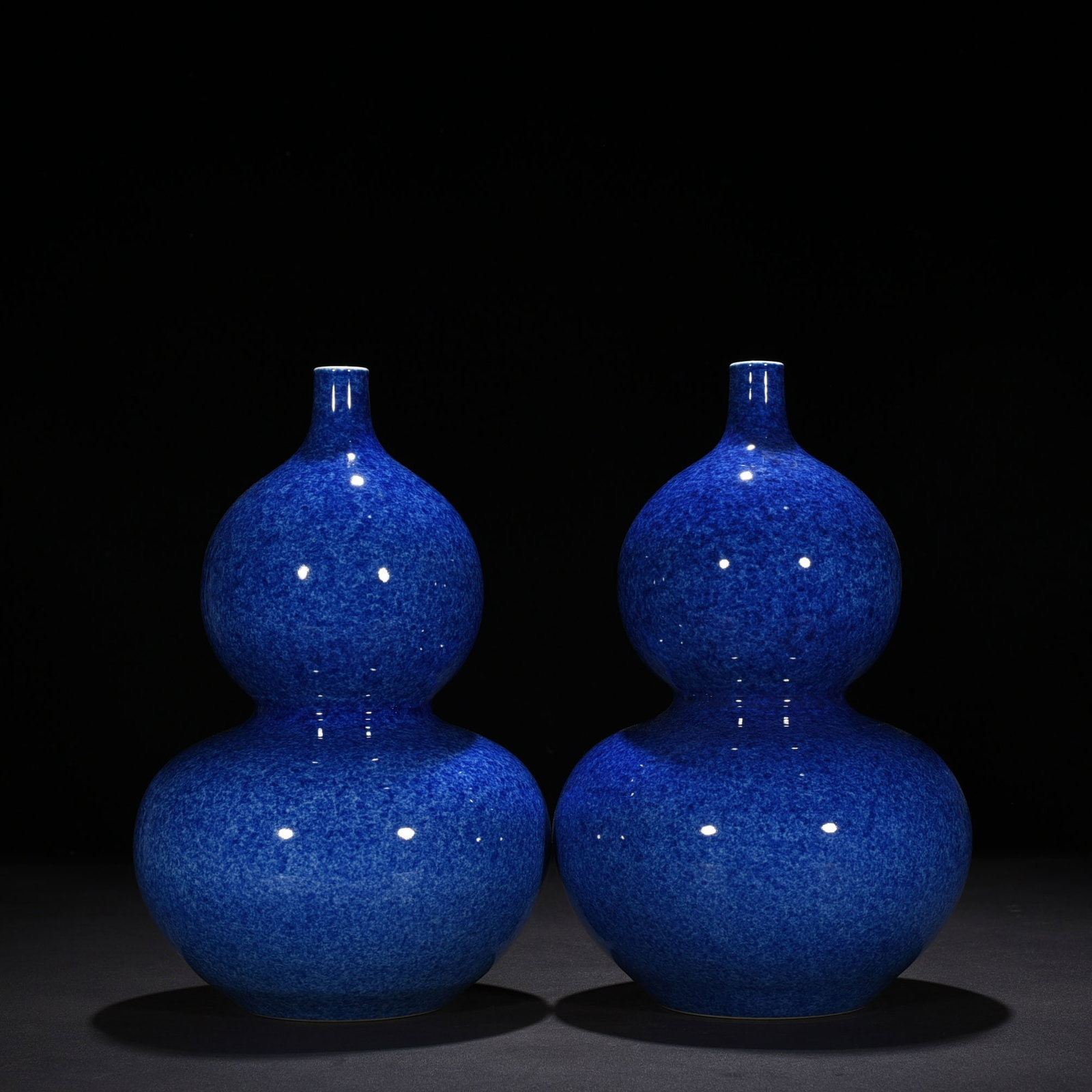 An Exquisite Chinese blue-glazed gourd vase: Size: Height 30 cm - Width 22 cm |Materials: Porcelain |Style Dynasty: Qing dynasty |Inscription: Qianlong Mark |Object: vase