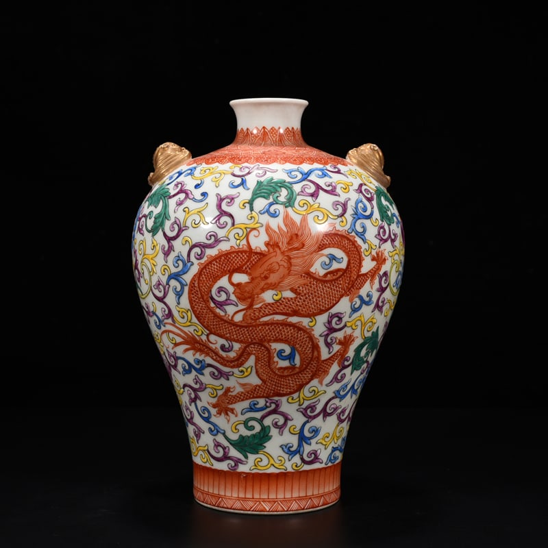 An Exquisite Chinese famille rose double-eared plum vase: Size: Height 25 cm - Width 16 cm |Materials: Porcelain |Style Dynasty: Qing dynasty |Inscription: Qianlong Mark |Object: plum vase
