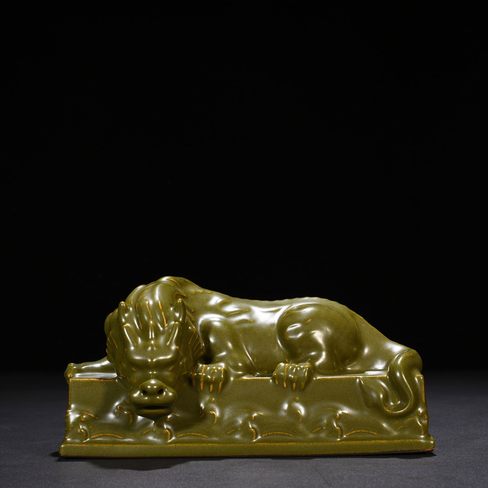 An Exquisite Chinese tea powder glazed unicorn auspicious beast pressure ruler: Size: Width 22 cm - Height 11 cm |Materials: Porcelain |Style Dynasty: Qing dynasty |Inscription: Qianlong Mark |Object: statue