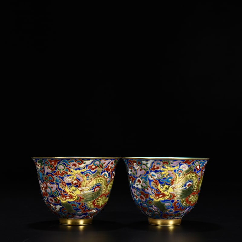 An Exquisite Chinese blue ground enamel cup with gold cloud and dragon: Size: Width 8.9 cm - Height 6.5 cm |Materials: Porcelain |Style Dynasty: Qing dynasty |Inscription: Qianlong Mark |Object: cup