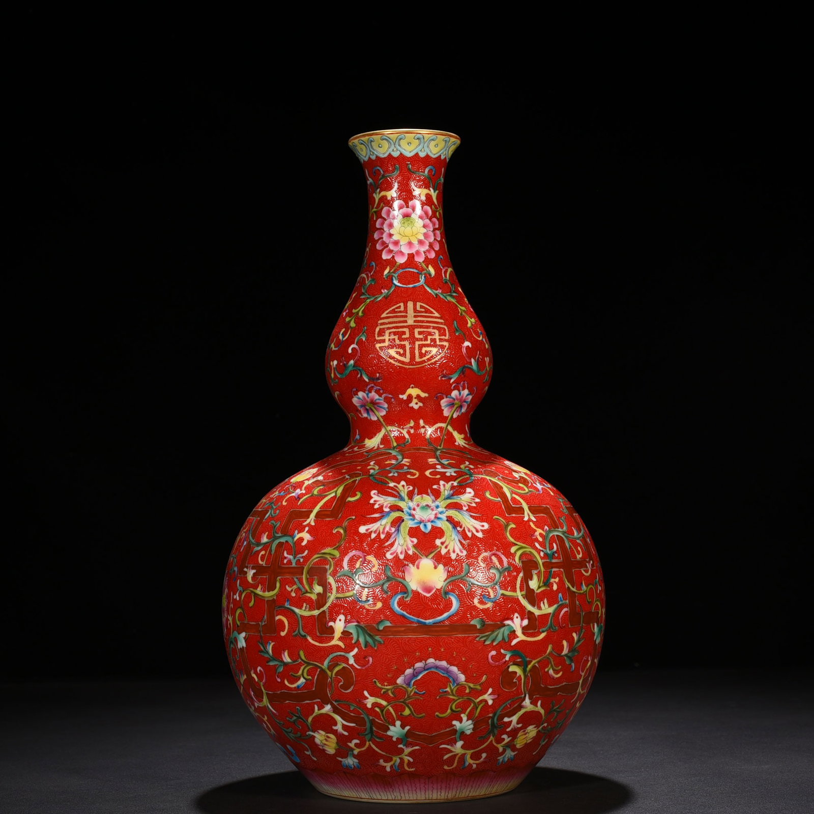 An Exquisite Chinese rolling red ground pastel gourd vase with longevity and florals: Size: Height 40 cm - Width 22 cm |Materials: Porcelain |Style Dynasty: Qing dynasty |Inscription: Qianlong Mark |Object: vase