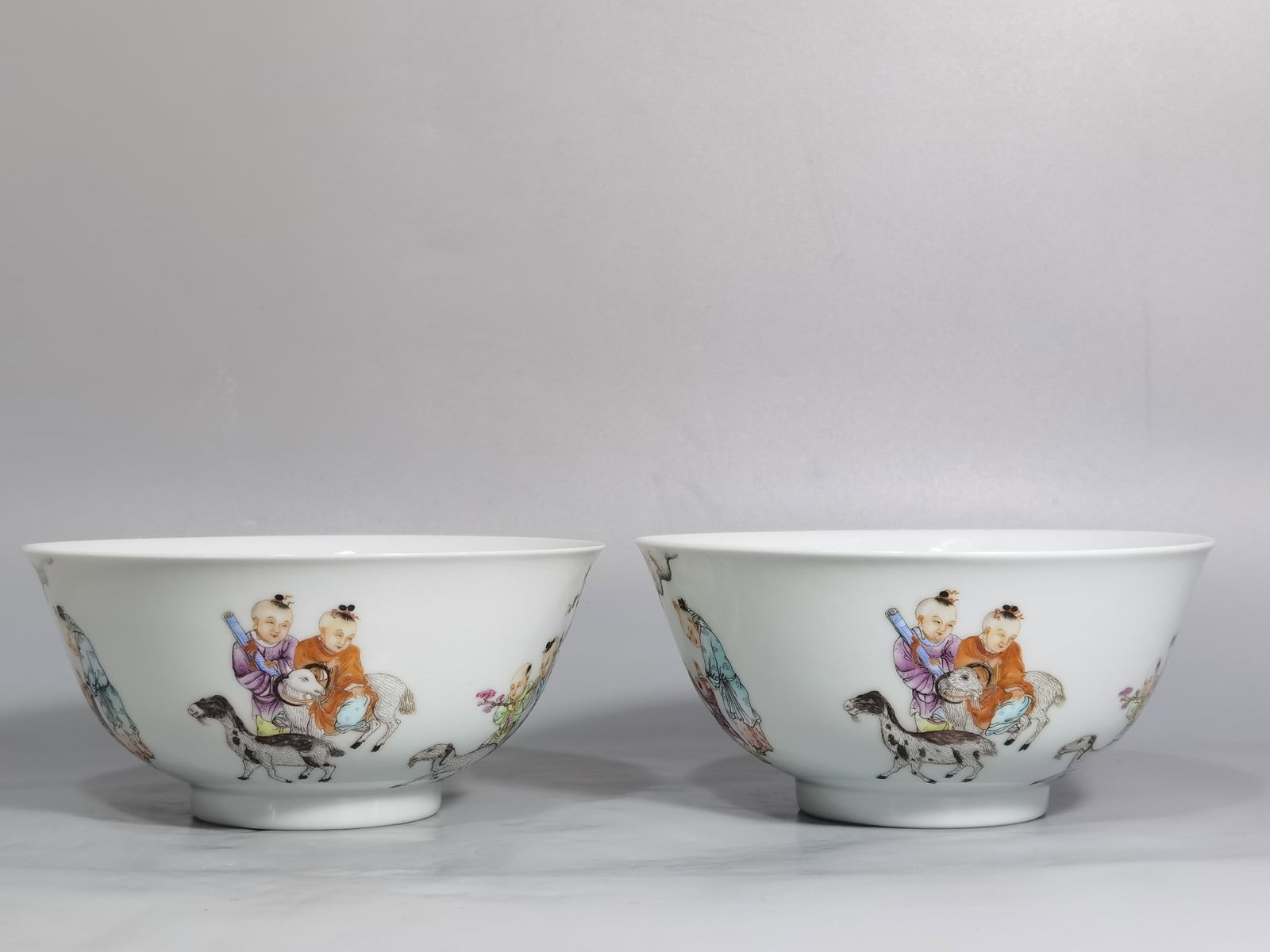 An Exquisite Chinese A pair of enamel baby playing bowls: Size: Width 14.5 cm - Height 7 cm |Materials: Porcelain |Style Dynasty: Qing dynasty |Inscription: Qianlong Mark |Object: bowl