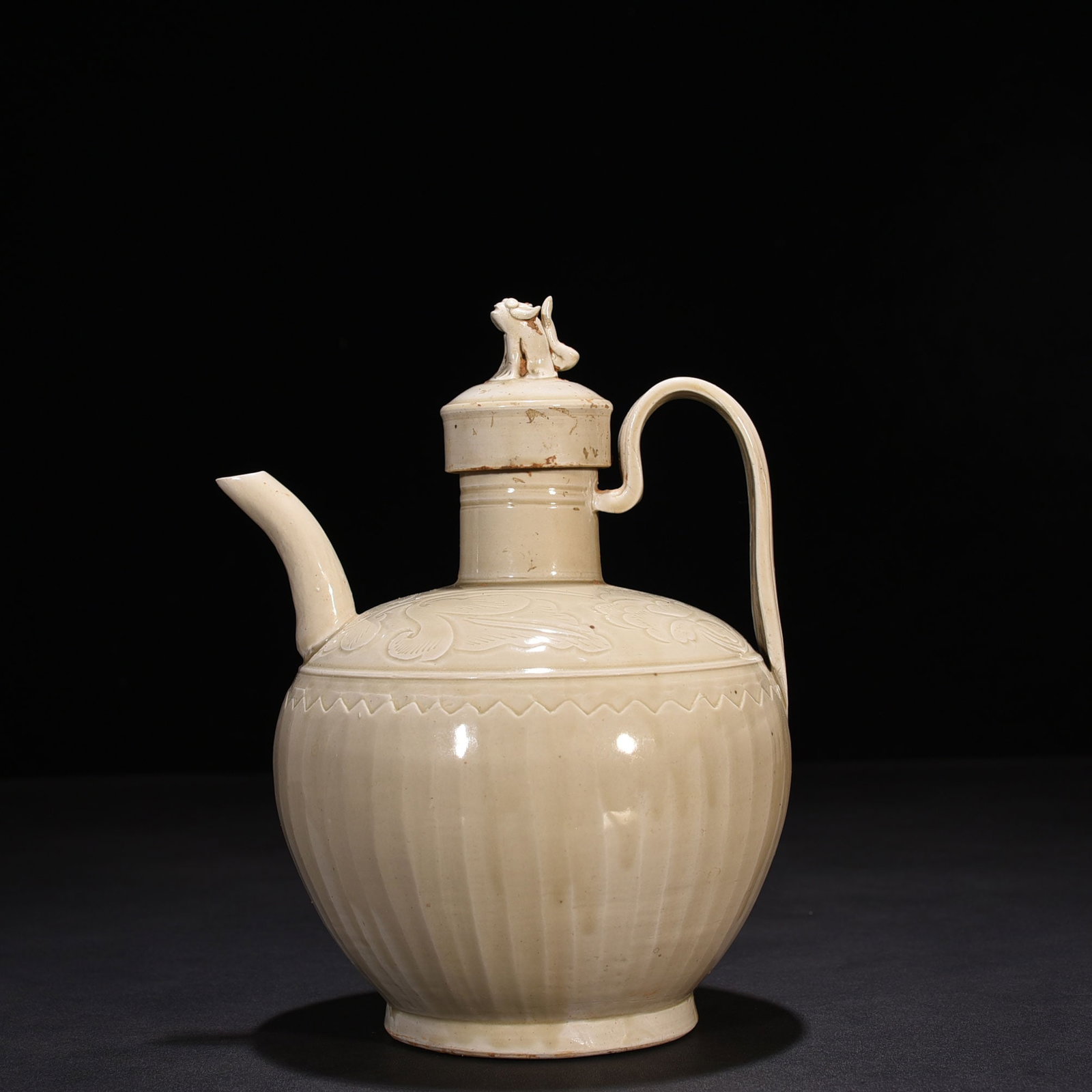 An Exquisite Chinese Ding Kiln carved banana leaf and flower pattern ewer: Size: Height 21 cm - Width 14 cm |Materials: Porcelain |Style Dynasty: Song dynasty |Attributed: 10th-c |Object: pot