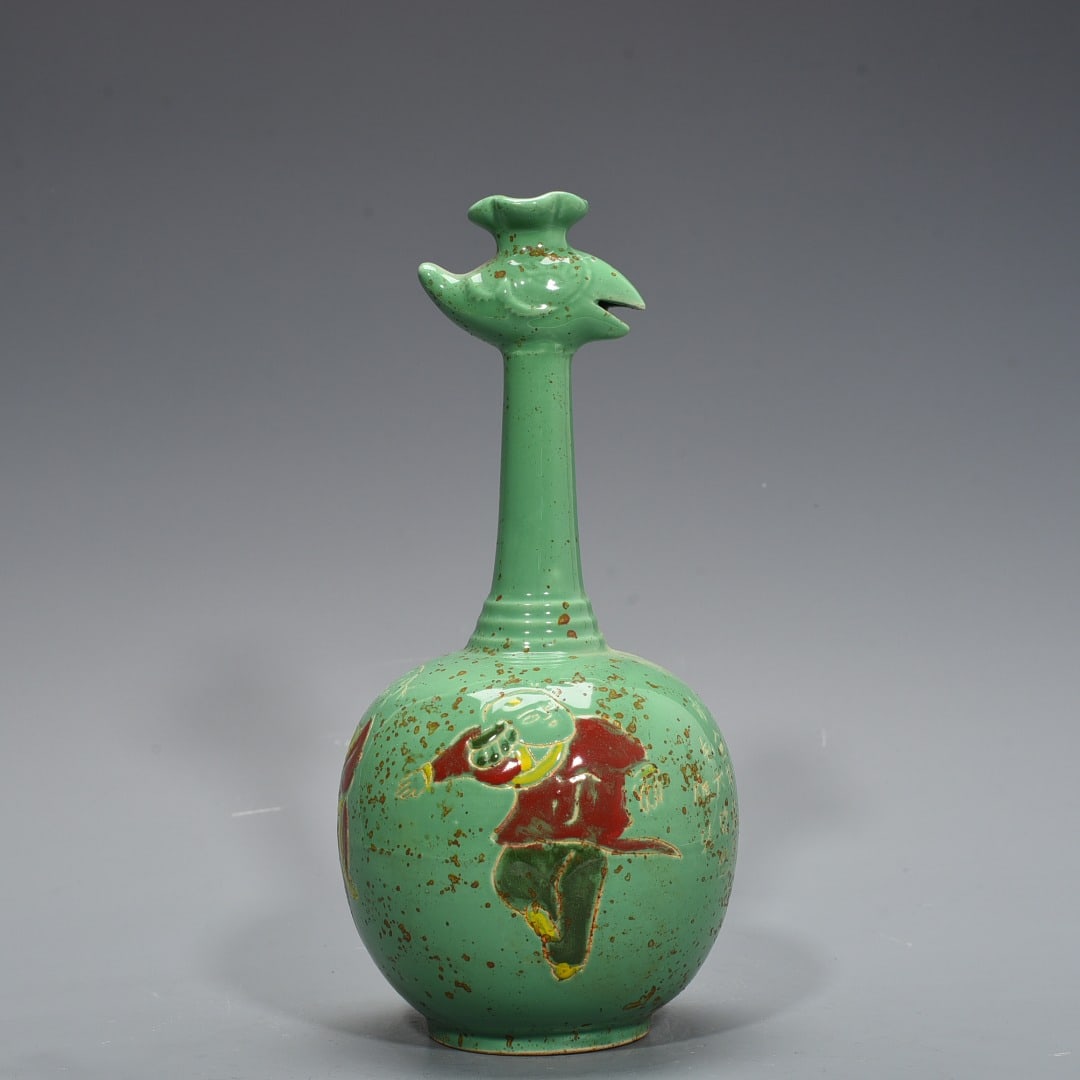 An Exquisite Chinese Ding kiln style green glaze engraved with baby playing pattern and phoenix head: Size: Height 28 cm - Width 13 cm |Materials: Porcelain |Style Dynasty: Song dynasty |Attributed: 10th-c |Object: pot