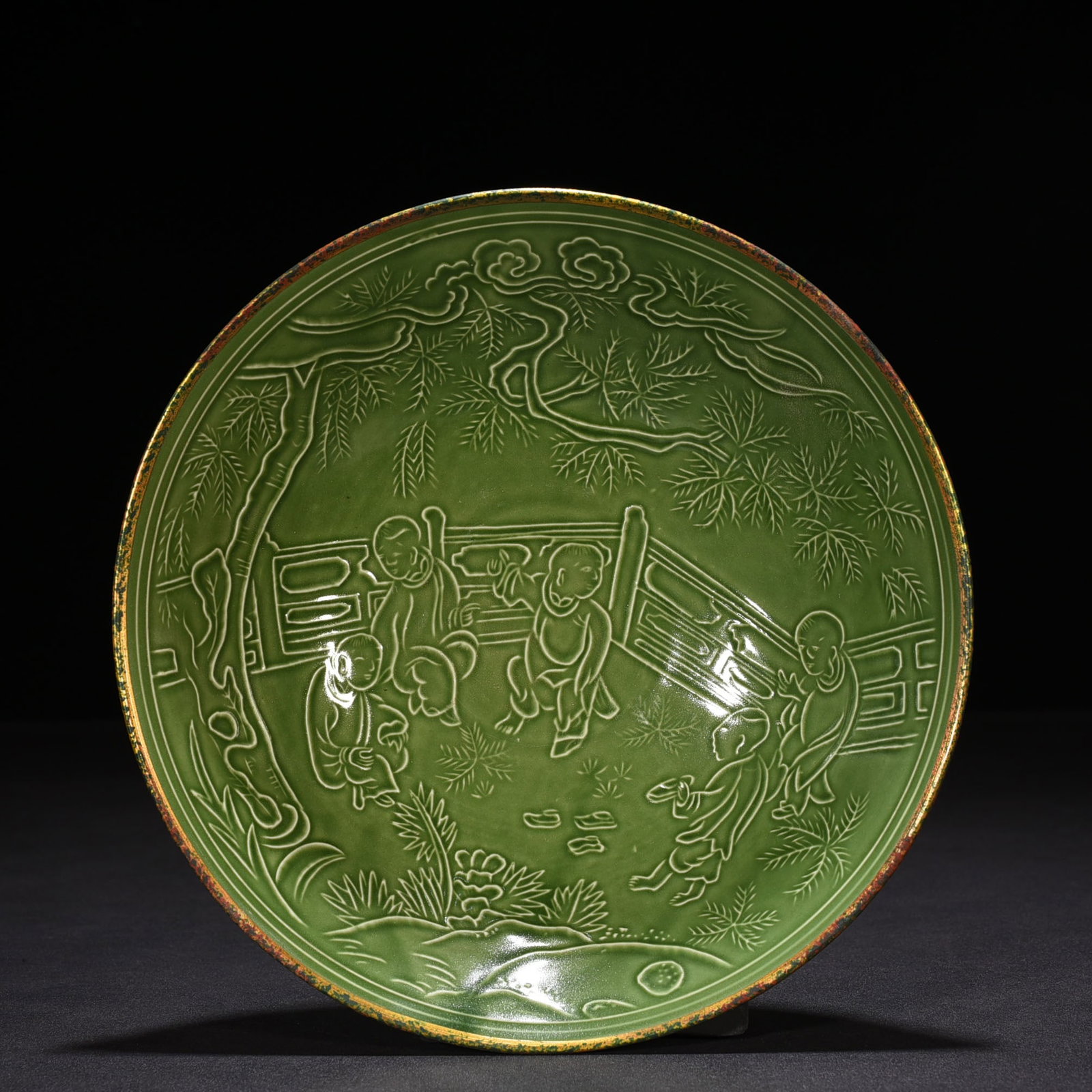 An Exquisite Chinese Ding kiln green glaze baby play bowl inlaid with copper mouth