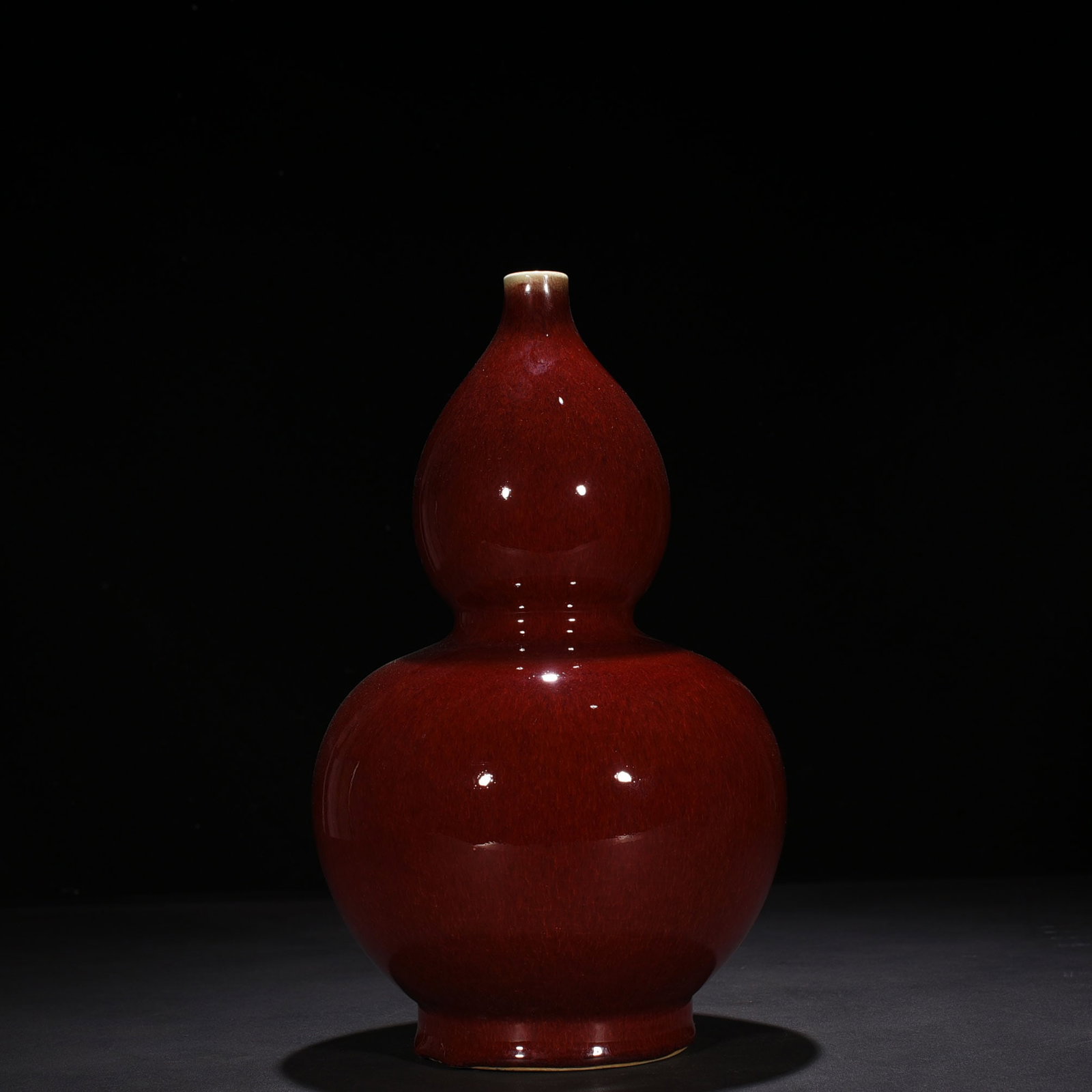 An Exquisite Chinese period of the Red-glazed gourd vase: Size: Height 33 cm - Width 20 cm |Materials: Porcelain |Style Dynasty: Qing dynasty |Inscription: Qianlong Mark |Object: vase