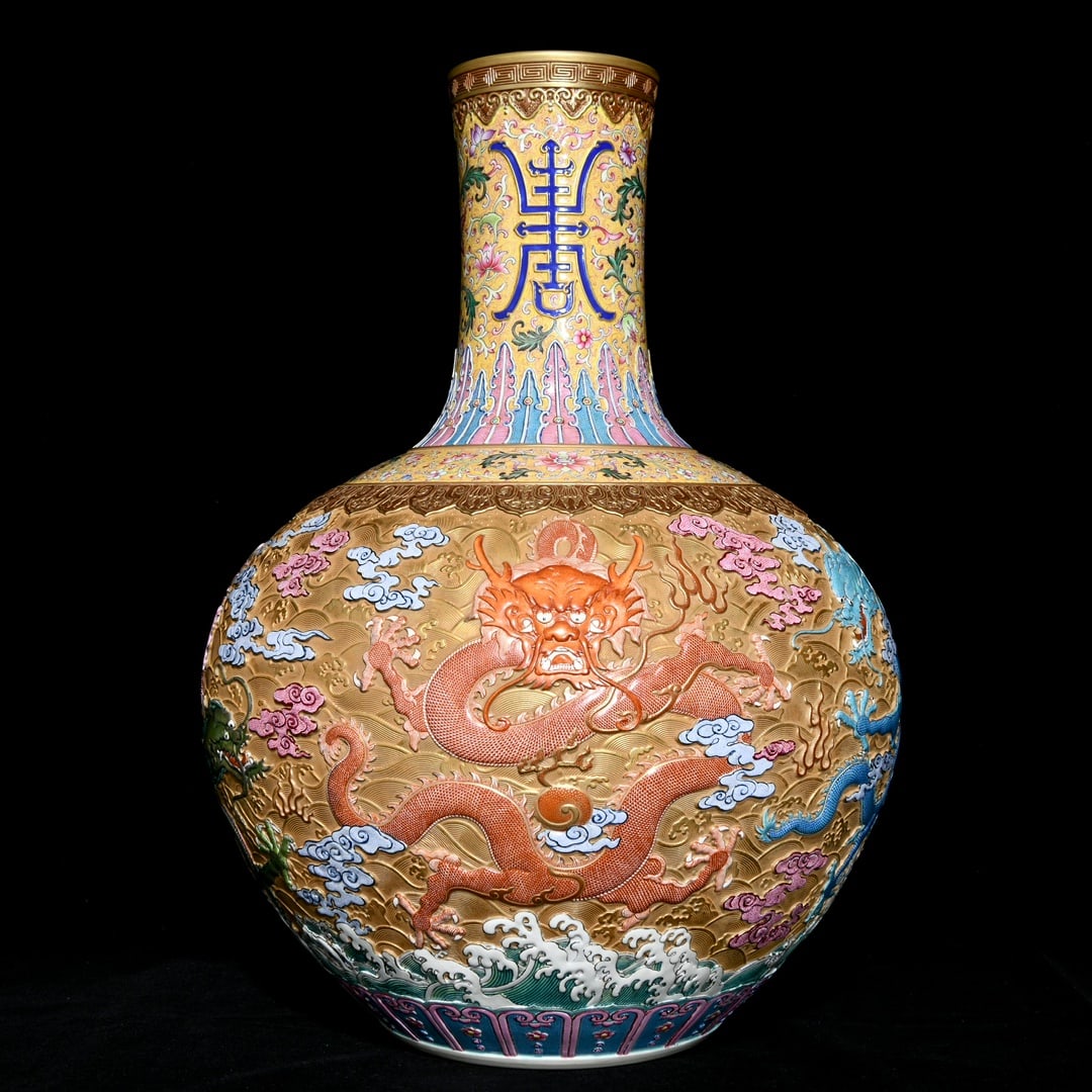 An exquisite Chinese gold-ground relief famille rose celestial sphere vase with five dragon: Size: Height 54 cm - Width 41 cm |Materials: Porcelain |Style Dynasty: Qing dynasty |Inscription: Qianlong Mark |Object: Chinese Antique