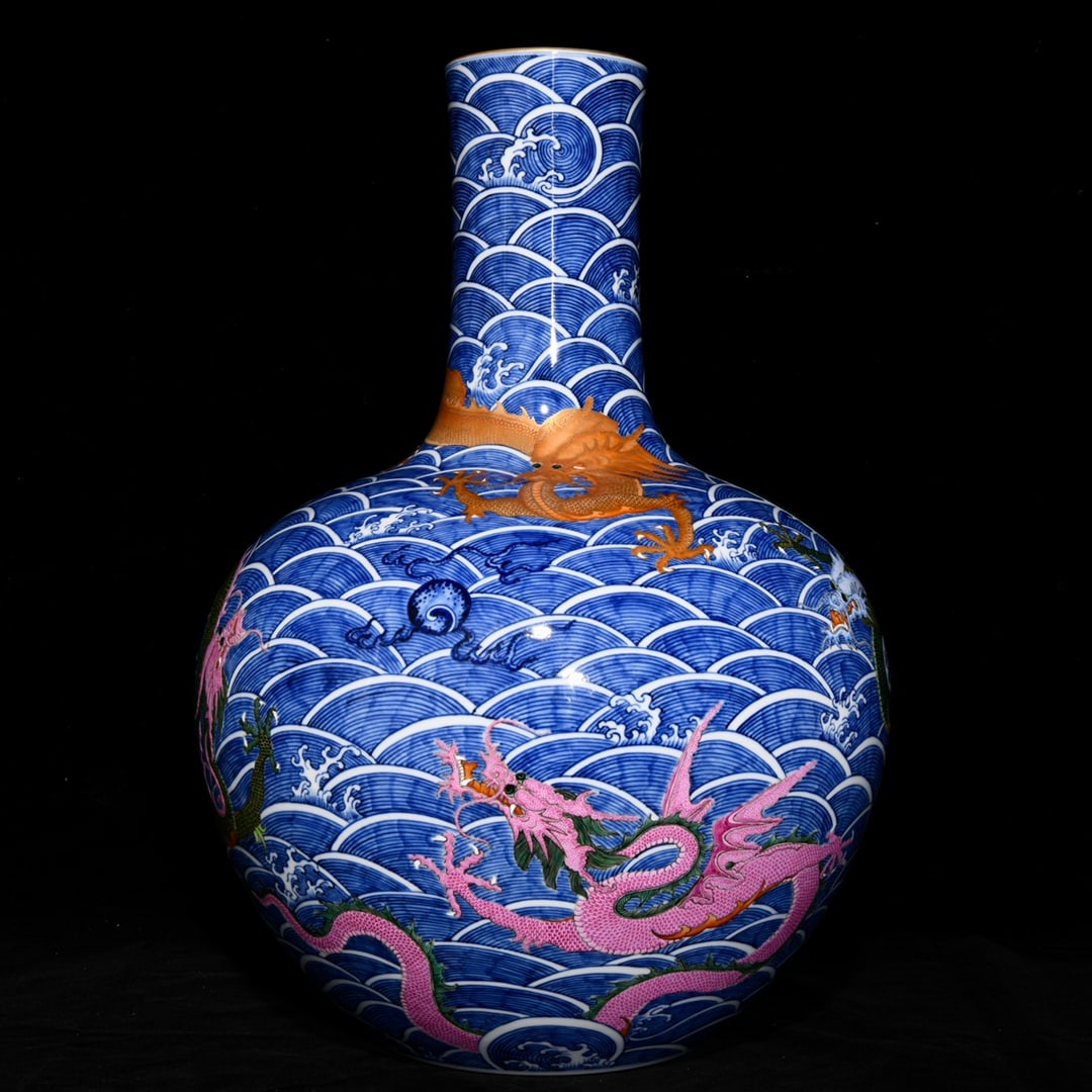 An exquisite Chinese blue and white pastel celestial sphere with gold sea water and dragon: Size: Height 54 cm - Width 37.5 cm |Materials: Porcelain |Style Dynasty: Qing dynasty |Inscription: Qianlong Mark |Object: Chinese Antique