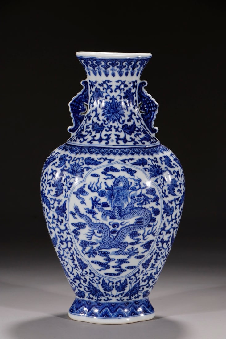 An Exquisite Chinese Blue and white lotus with twining branches upright dragon and flat vase with: Size: Height 36.2 cm - Width 14.2 cm |Materials: Porcelain |Style Dynasty: Qing dynasty |Inscription: Qianlong Mark |Object: Chinese Antique