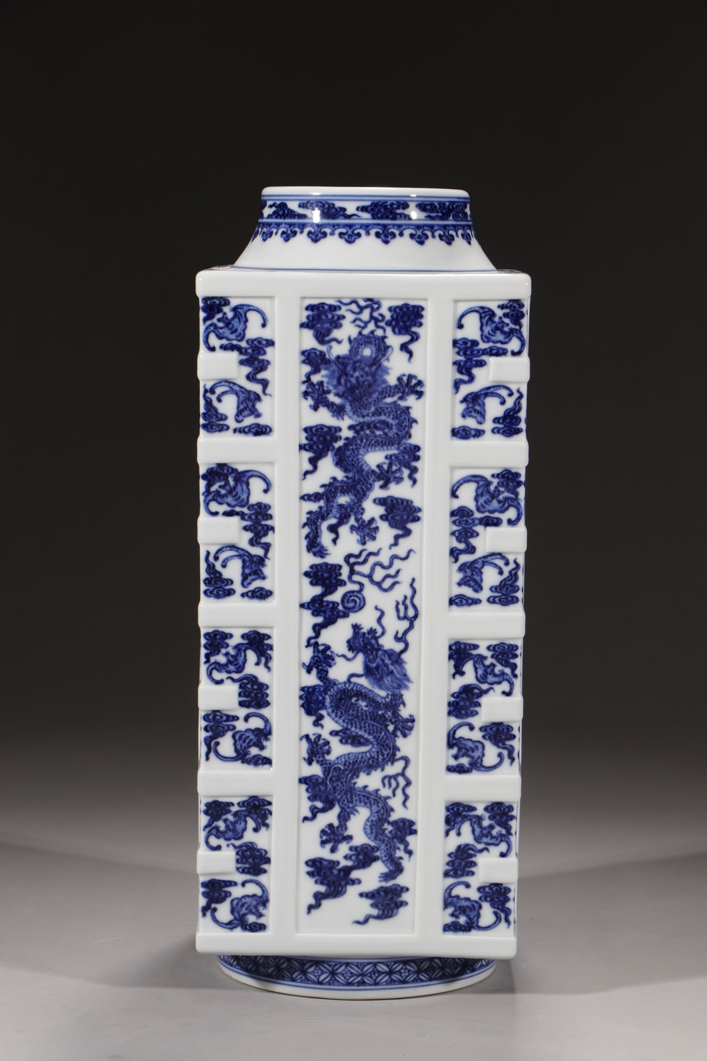 An Exquisite Chinese blue and white square inlay with bat and dragons vase: Size: Height 36.5 cm - Width 14.2 cm |Materials: Porcelain |Style Dynasty: Qing dynasty |Inscription: Qianlong Mark |Object: Chinese Antique