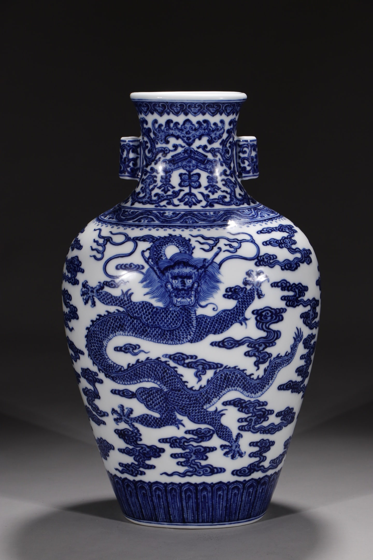 An Exquisite Chinese Blue and white flat vase with moving clouds and dragon penetrating the ears: Size: Height 35 cm - Width 14.2 cm |Materials: Porcelain |Style Dynasty: Qing dynasty |Inscription: Qianlong Mark |Object: Chinese Antique