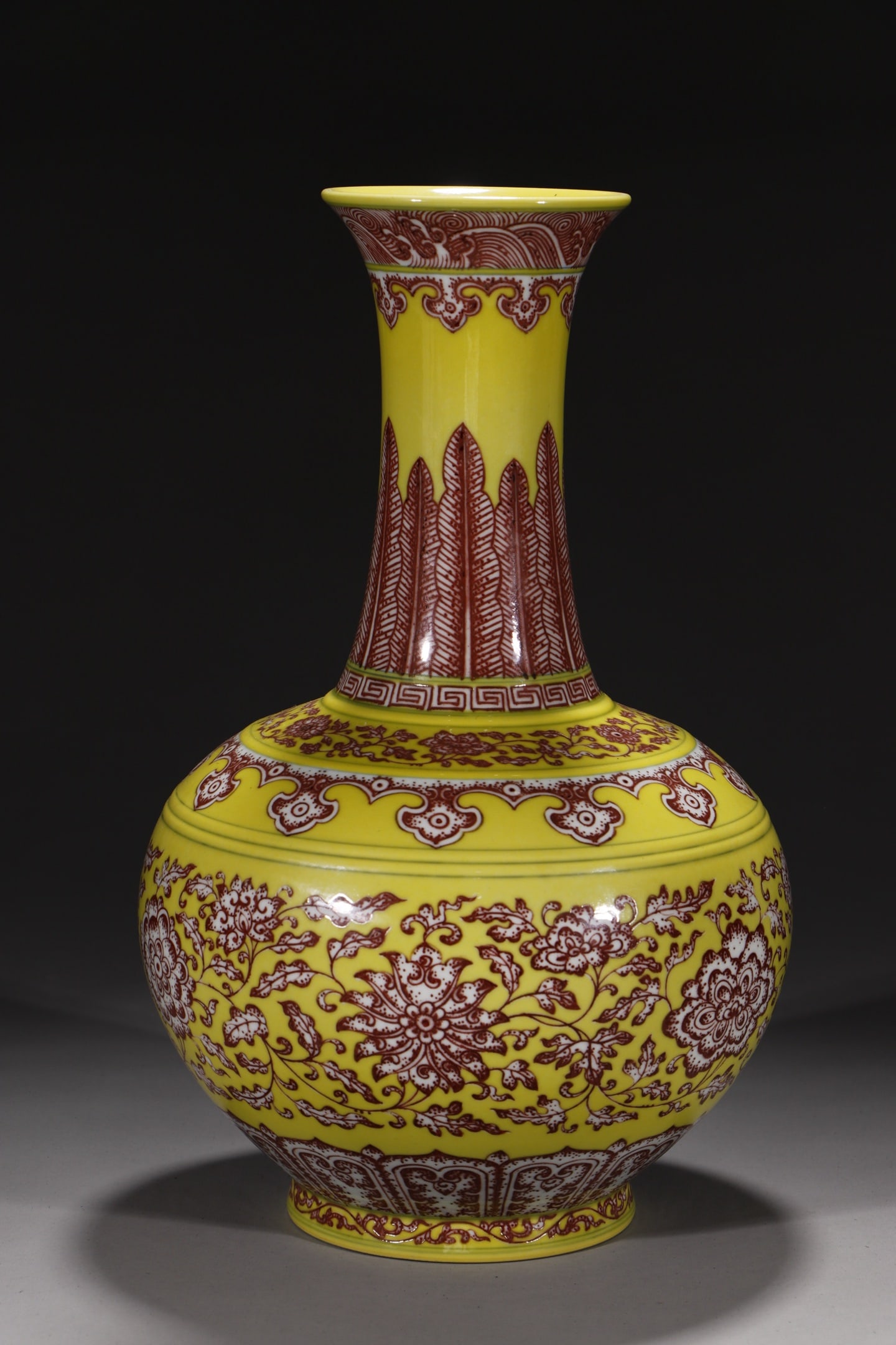 An Exquisite Chinese vase with red lotus on yellow ground and under glaze: Size: Height 32 cm - Width 14.2 cm |Materials: Porcelain |Style Dynasty: Qing dynasty |Inscription: Qianlong Mark |Object: Chinese Antique