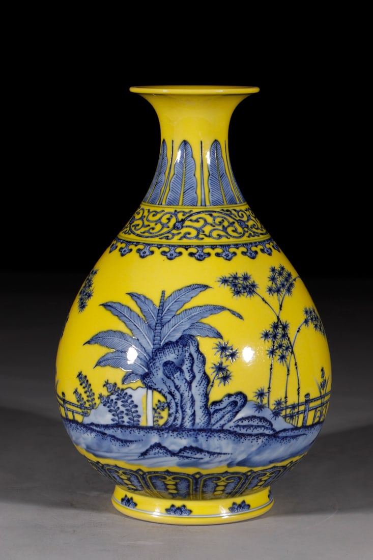 An Exquisite Chinese spring vase with blue and white flowers on yellow ground and entwined branches: Size: Height 30 cm - Width 14.2 cm |Materials: Porcelain |Style Dynasty: Qing dynasty |Inscription: Qianlong Mark |Object: Chinese Antique