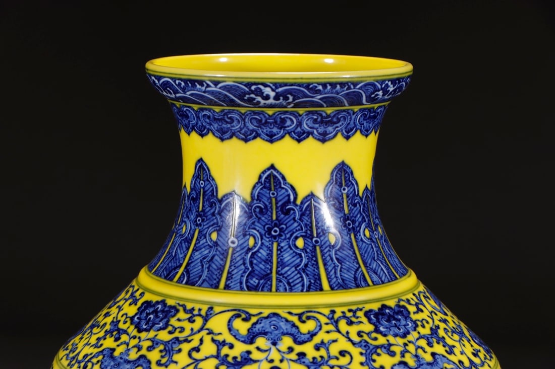 An Exquisite Chinese Blue and white lotus on yellow ground vase with eight treasures fish basket: Size: Height 35.8 cm - Width 14.2 cm |Materials: Porcelain |Style Dynasty: Qing dynasty |Inscription: Qianlong Mark |Object: Chinese Antique