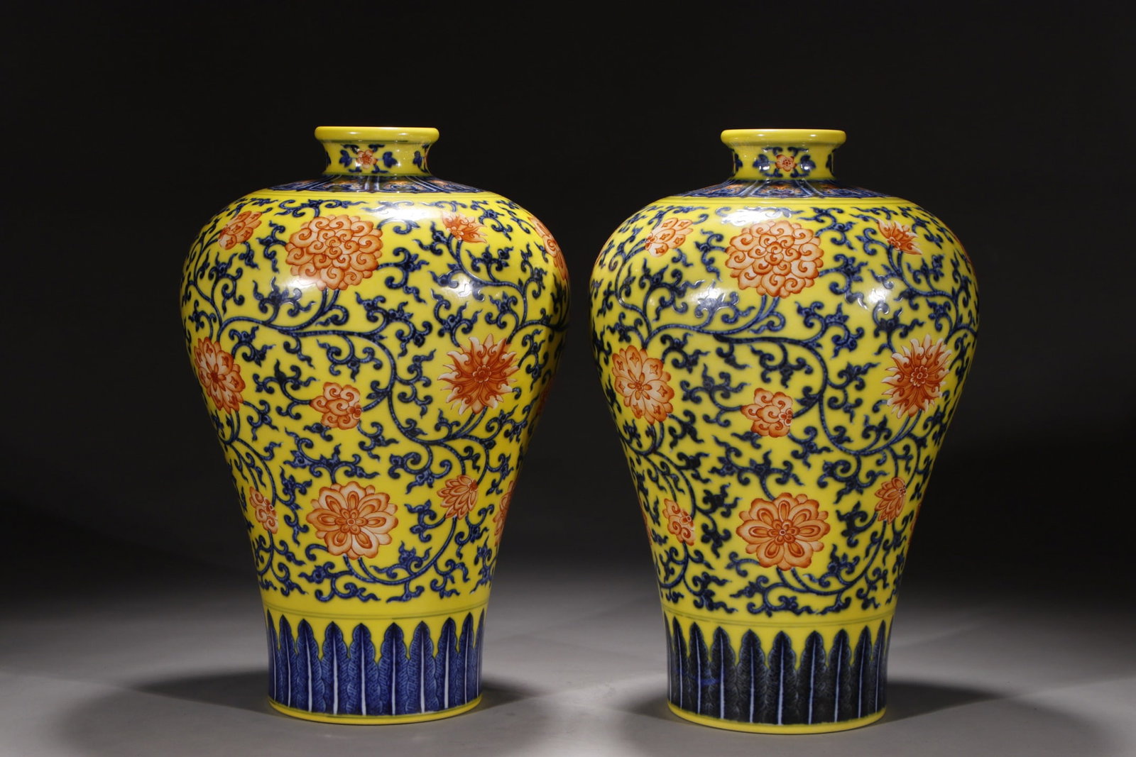 An Exquisite Chinese red plum vase with blue and white flowers on yellow ground lotus leaves and: Size: Height 33 cm - Width 14.2 cm |Materials: Porcelain |Style Dynasty: Qing dynasty |Inscription: Qianlong Mark |Object: Chinese Antique