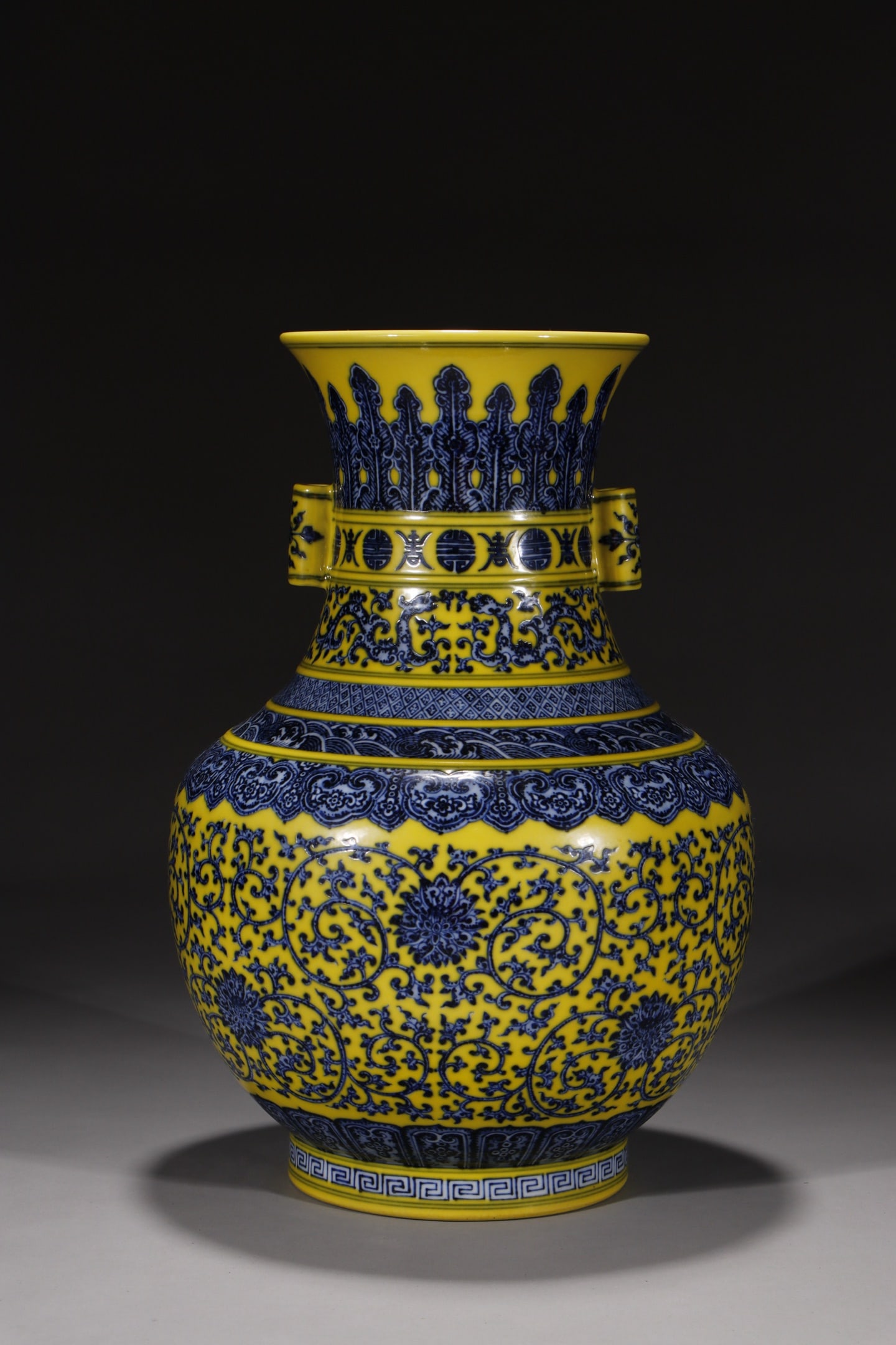 An Exquisite Chinese yellow ground blue and white lotus lotus square pointed vase with ears: Size: Height 37 cm - Width 14.2 cm |Materials: Porcelain |Style Dynasty: Qing dynasty |Inscription: Qianlong Mark |Object: Chinese Antique
