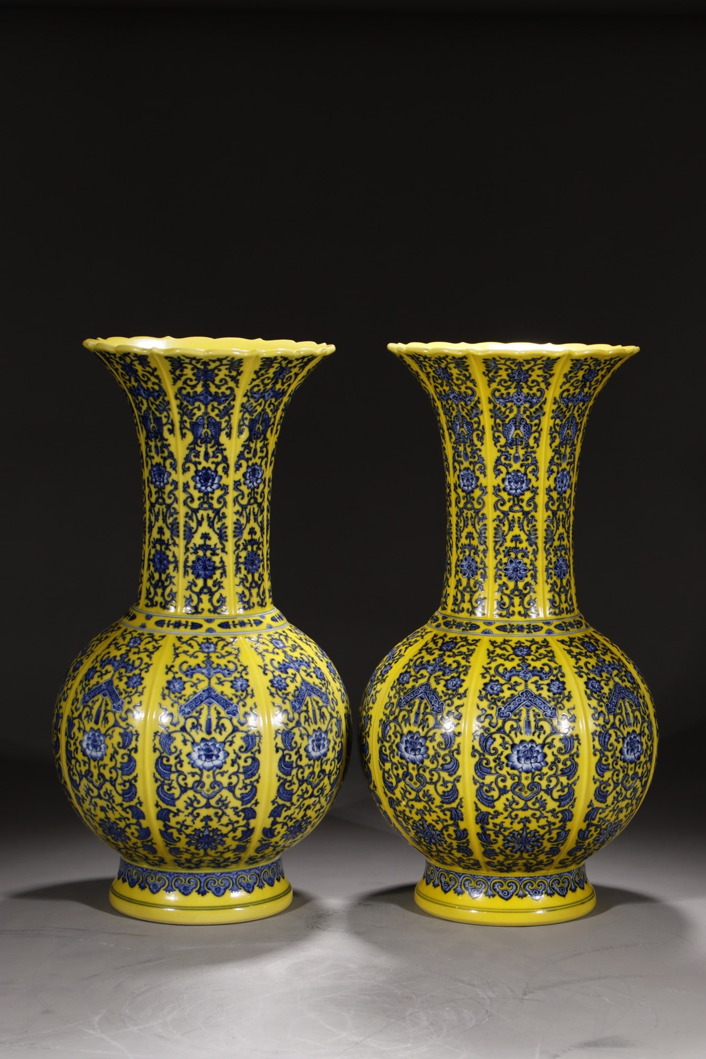 An Exquisite Chinese Lotus vase with blue and white flowers on yellow ground: Size: Height 47 cm - Width 14.2 cm |Materials: Porcelain |Style Dynasty: Qing dynasty |Inscription: Qianlong Mark |Object: Chinese Antique