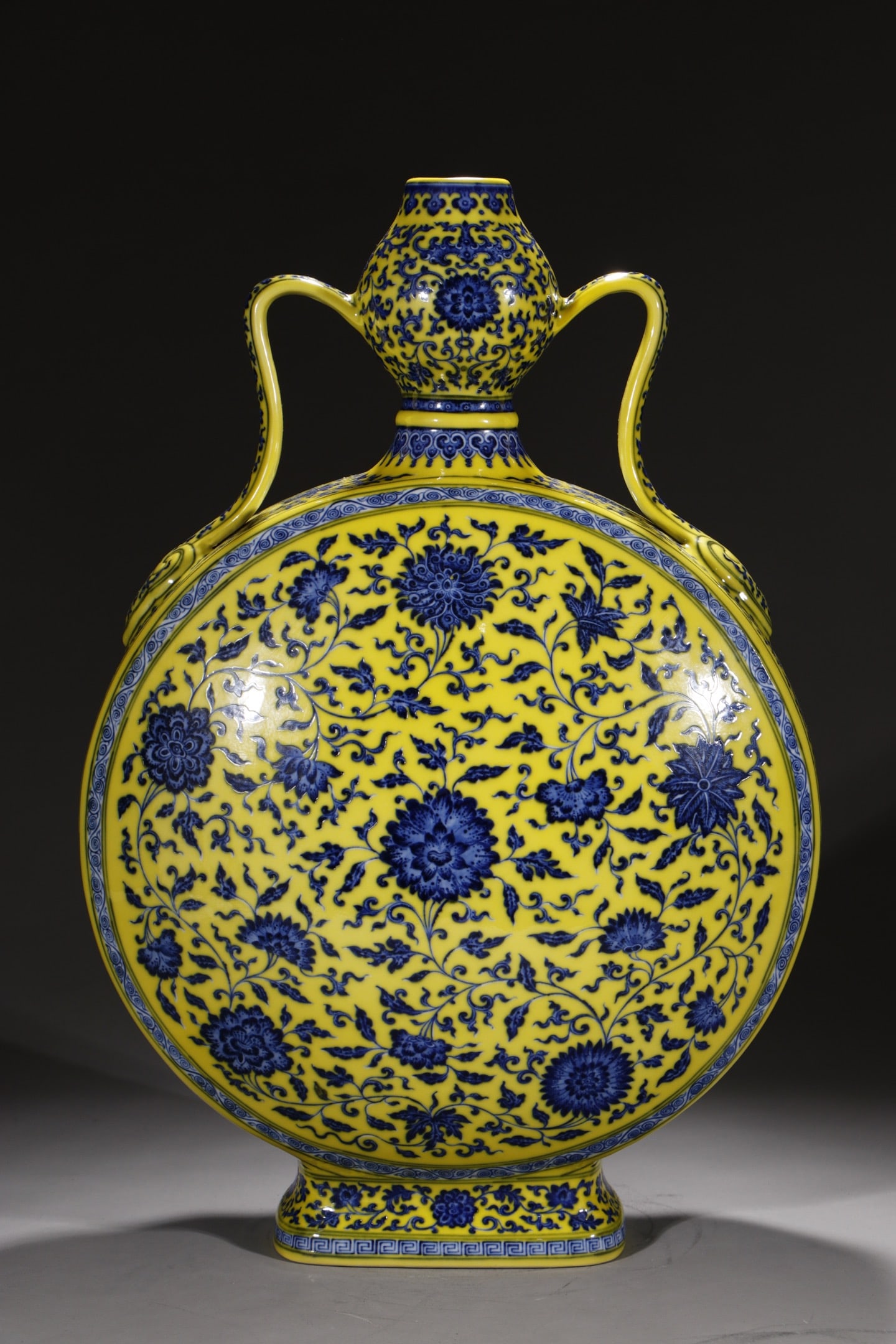 An Exquisite Chinese flat vase with yellow ground blue and white lotus and garlic head: Size: Height 55.5 cm - Width 14.2 cm |Materials: Porcelain |Style Dynasty: Qing dynasty |Inscription: Qianlong Mark |Object: Chinese Antique