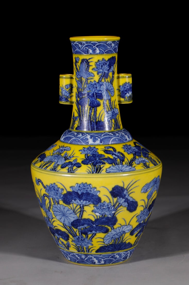 An Exquisite Chinese blue and white lotus shaped vase with yellow ground: Size: Height 33.3 cm - Width 14.2 cm |Materials: Porcelain |Style Dynasty: Qing dynasty |Inscription: Qianlong Mark |Object: Chinese Antique