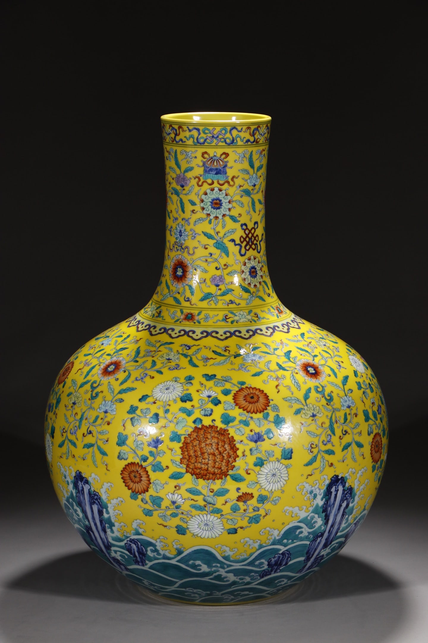 An Exquisite Chinese celestial sphere vase with colorful lotus and eight treasures on yellow ground: Size: Height 50.5 cm - Width 14.2 cm |Materials: Porcelain |Style Dynasty: Qing dynasty |Inscription: Yongzheng Mark |Object: Chinese Antique