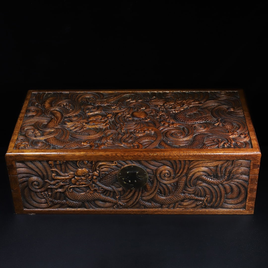 An Exquisite Chinese Rosewood high relief five dragon treasure chest storage box: Size: Width 65 cm - Height 21 cm Materials: Rosewood Style Dynasty: Qing Dynasty Attributed: Qinalong Period Object: Chinese Antique