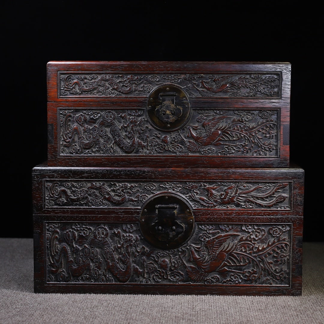 An Exquisite Chinese sandalwood A set of red carved dragons and phoenixes boxes: Size: Width 45 cm - Height 26 cm Materials: Rosewood Style Dynasty: Qing Dynasty Attributed: Qinalong Period Object: Chinese Antique