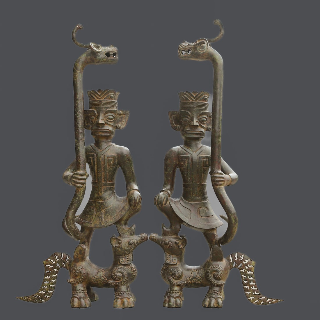 An Exquisite Chinese Pair of Bronze Orc Riders: Size: Height 100 cm - Width 50 cm |Materials: Bronze |Style Dynasty: Sanxingdui dynasty |Attributed: 1700-bc |Object: Chinese Antique
