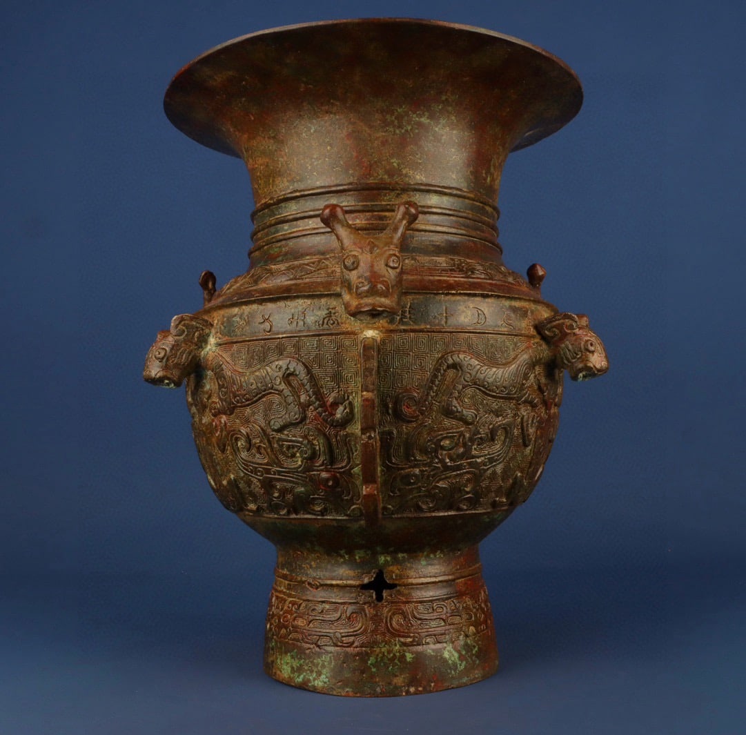 An Exquisite Chinese Bronze Dragon and Tiger Zun: Size: Height 34 cm - Width 30 cm |Materials: Bronze |Style Dynasty: zhou dynasty |Attributed: 700-bc |Object: Chinese Antique