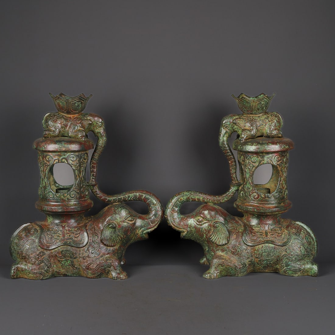 An Exquisite Chinese A pair of bronze elephant lanterns: Size: Height 35 cm - Width 30 cm |Materials: Bronze |Style Dynasty: han dynasty |Attributed: 1st to3rd-c |Object: Chinese Antique