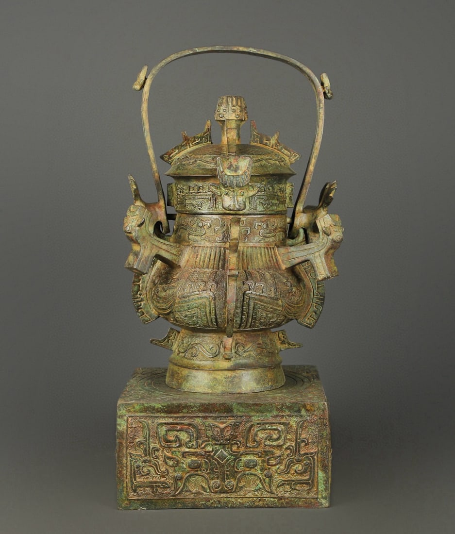 An Exquisite Chinese Bronze square seated full frame teapot