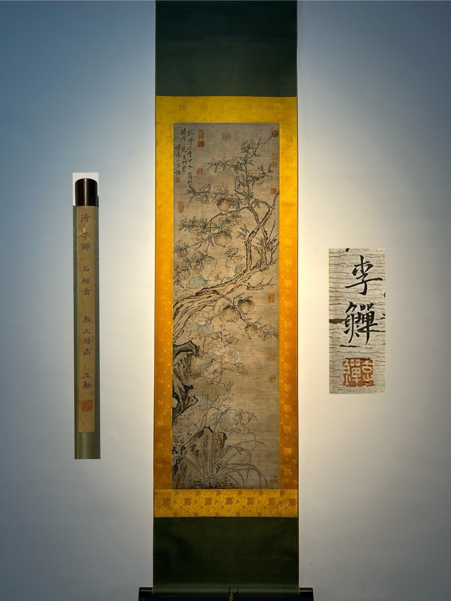 An Exquisite Chinese Scroll Hand Painting: Size: Height 140 cm - Width 40 cm |Materials: Silk and Paper |Style Dynasty: Qing Dynasty |Inscription: Li Shan |Object: Chinese Antique |A hand-painted "Pomegranate" scroll by Li Shan. Li Shan (1686?