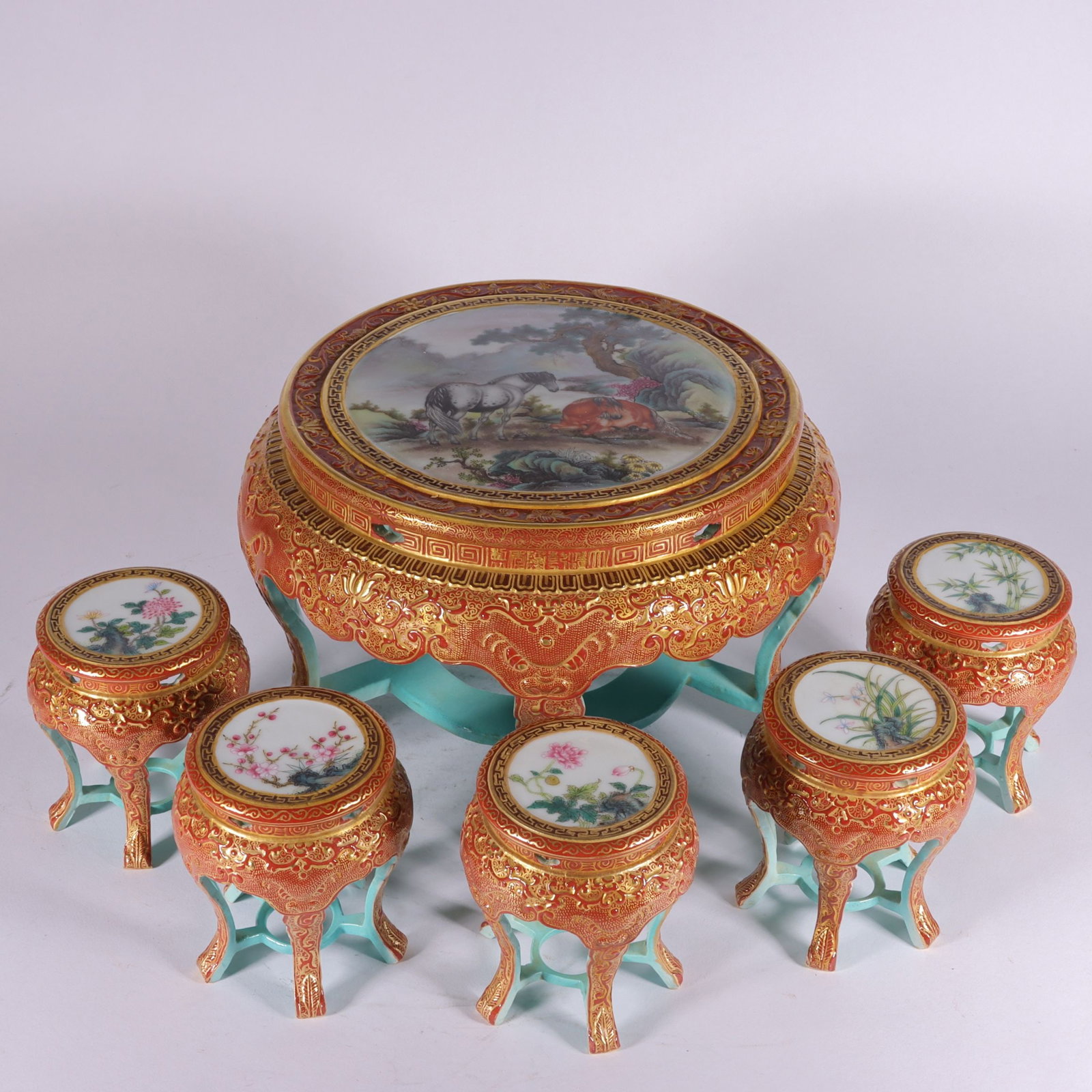 An Exquisite Chinese a set of enamel carved and gold-painted tea tables: Size: Height 9.5 cm - Width 8 cm |Materials: Porcelain |Style Dynasty: Qing dynasty |Inscription: Qianlong Mark |Object: stool