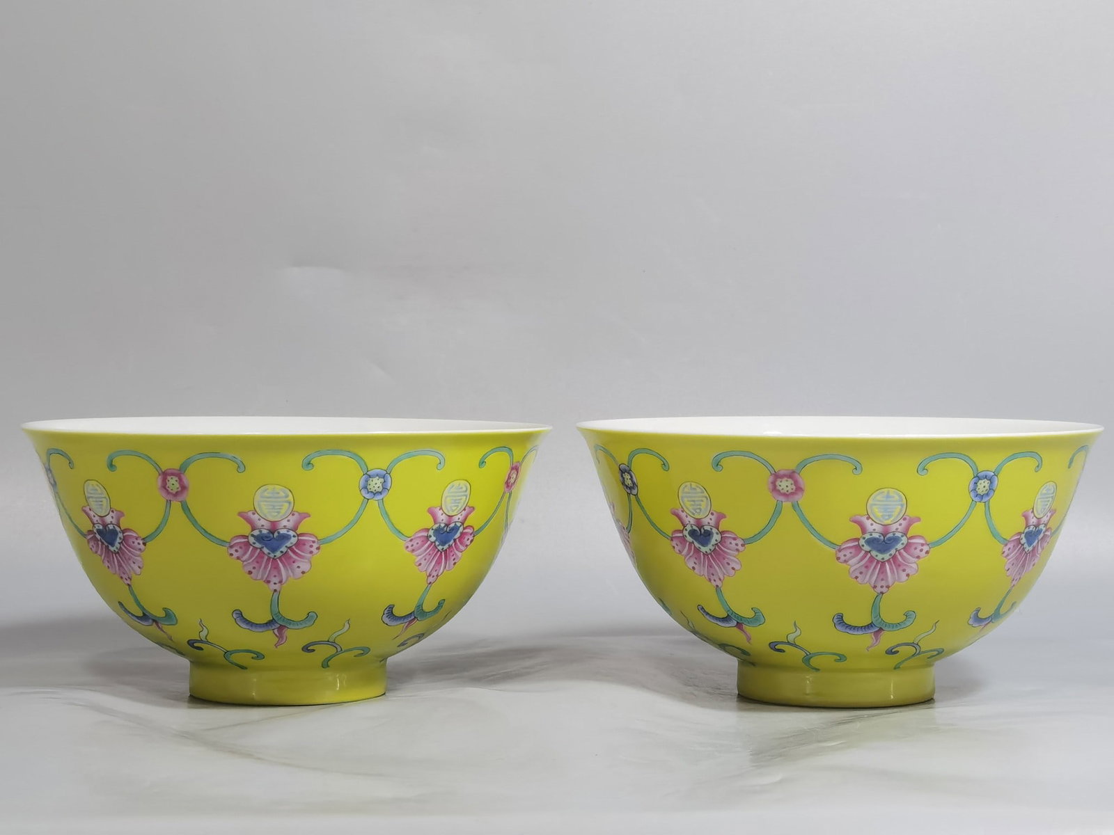 An Exquisite Chinese a pair of enamel yellow bowls: Size: Width 14.3 cm - Height 7.3 cm |Materials: Porcelain |Style Dynasty: Qing dynasty |Inscription: Qianlong Mark |Object: bowl