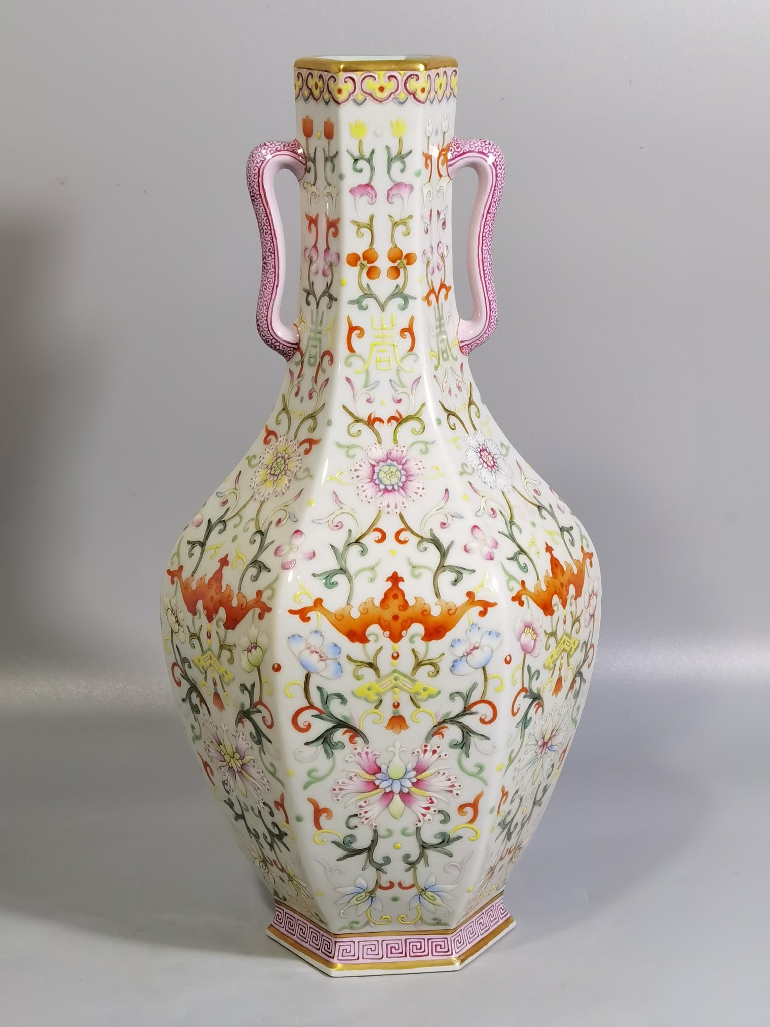 An Exquisite Chinese a pair of white-ground pastel-painted double-eared hexagonal vases (1 of 8)