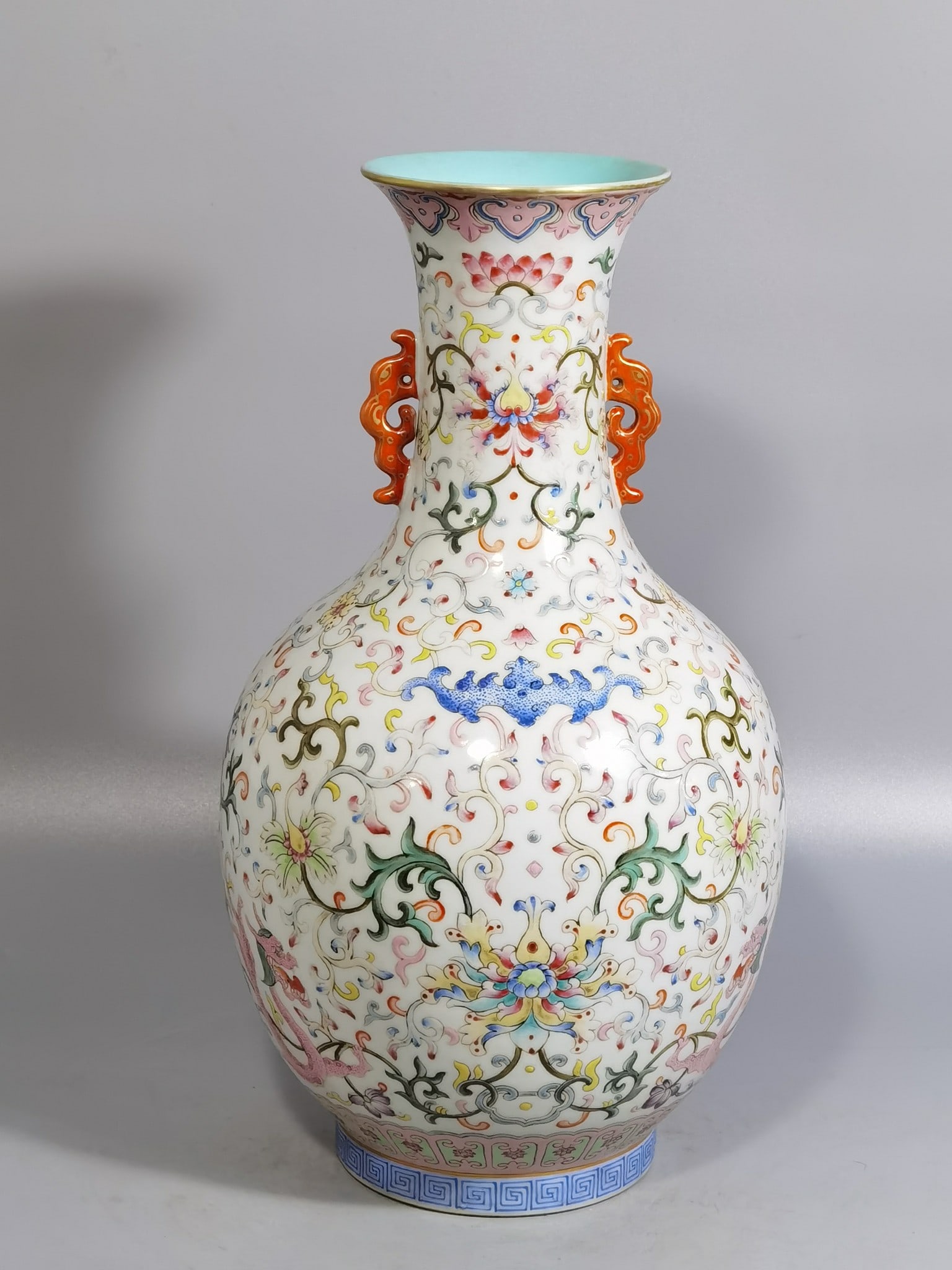 An Exquisite Chinese white ground pastel red dragon pierced flower double-eared mouth-opening bottle: Size: Height 32 cm - Width 17 cm |Materials: Porcelain |Style Dynasty: Qing dynasty |Inscription: Qianlong Mark |Object: bottle