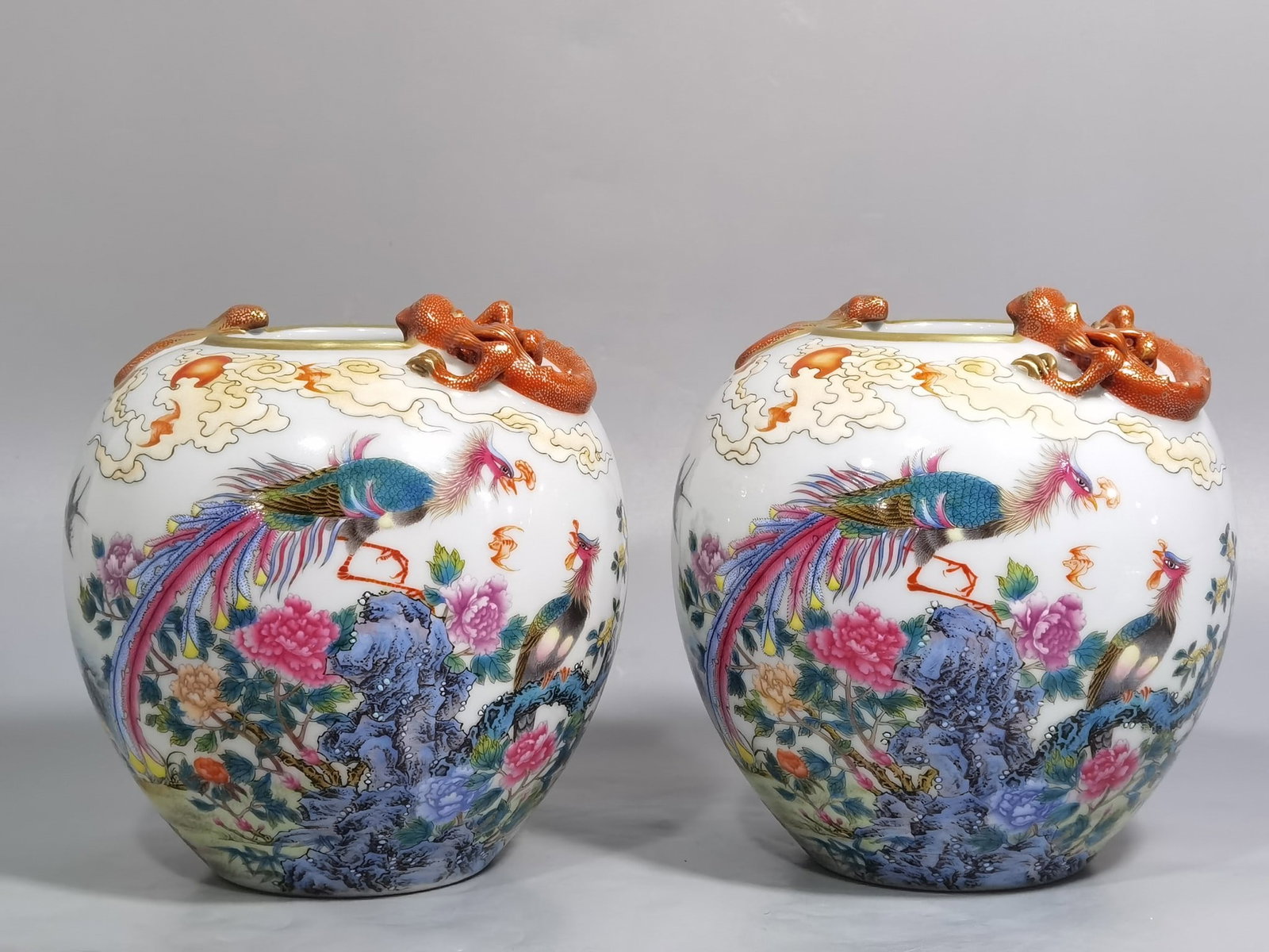 An Exquisite Chinese pastel phoenix pierced through peonies vase: Size: Height 14 cm - Width 13.5 cm |Materials: Porcelain |Style Dynasty: Qing dynasty |Inscription: Qianlong Mark |Object: vase