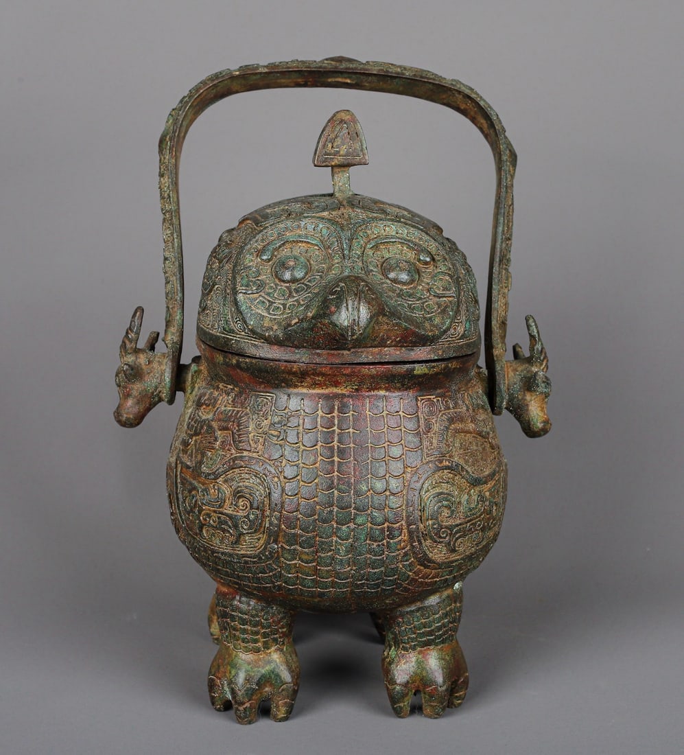 An Exquisite Chinese Bronze two headed beast carrying beam: Size: Height 28 cm - Width 21.5 cm |Materials: Bronze |Style Dynasty: zhou dynasty |Attribution: 700-BC |Object: Bell