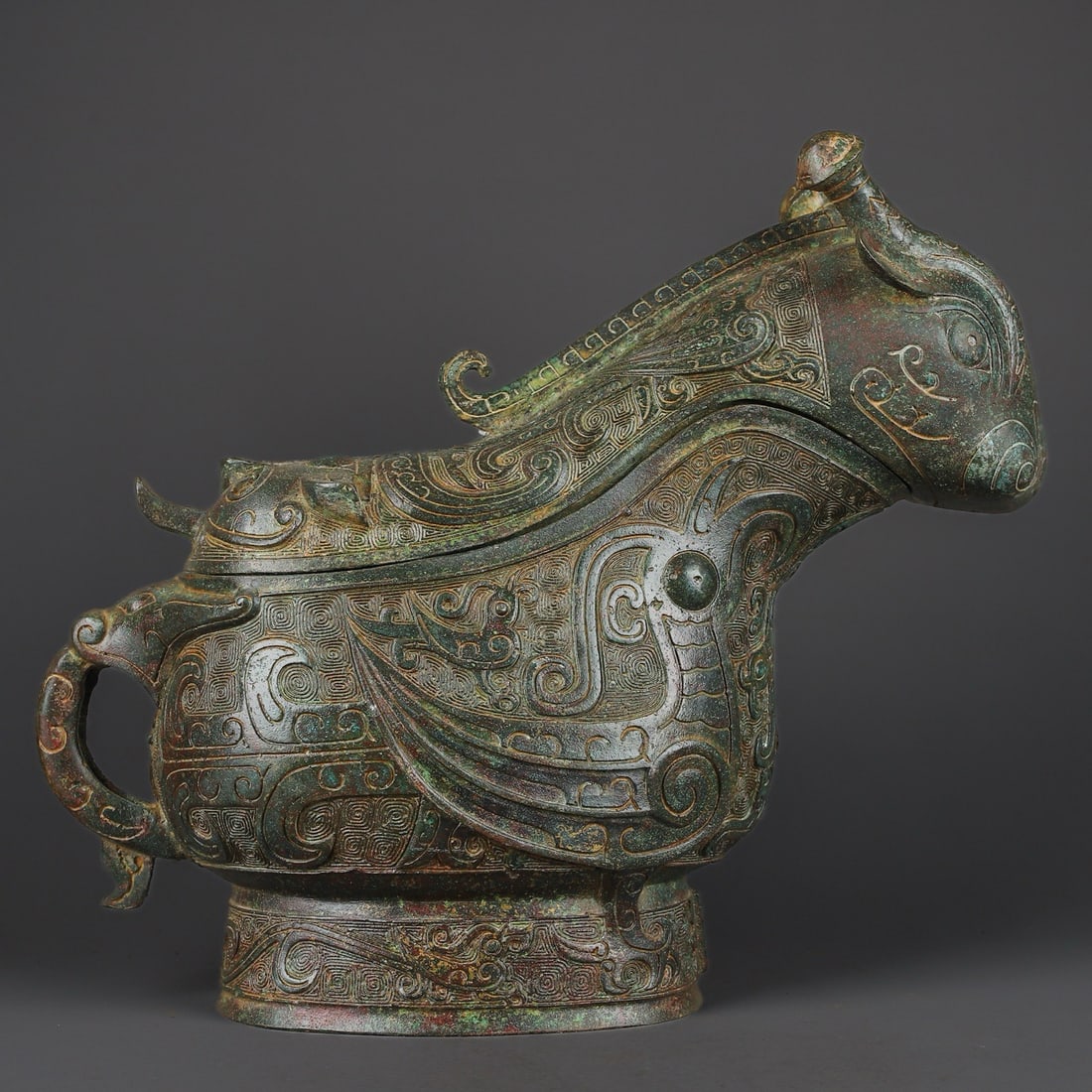 An Exquisite Chinese Bronze phoenix bird pattern and beast cup: Size: Height 34 cm - Width 40 cm |Materials: Bronze |Style Dynasty: zhou dynasty |Attribution: 700-BC |Object: Bell