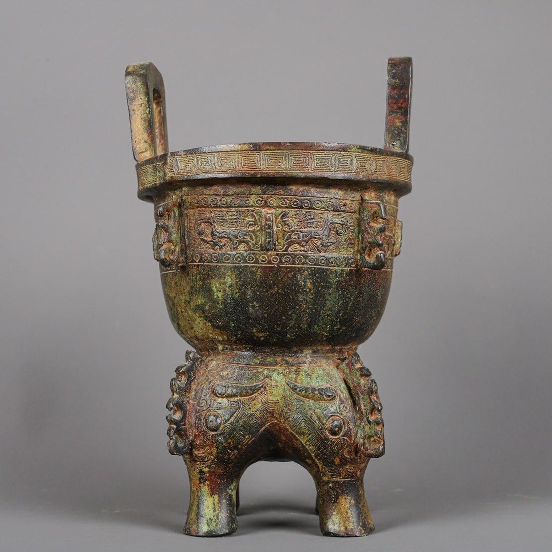 An Exquisite Chinese Bronze animal faced mortar: Size: Height 24 cm - Width 13.5 cm |Materials: Bronze |Style Dynasty: zhou dynasty |Attribution: 700-BC |Object: Bell