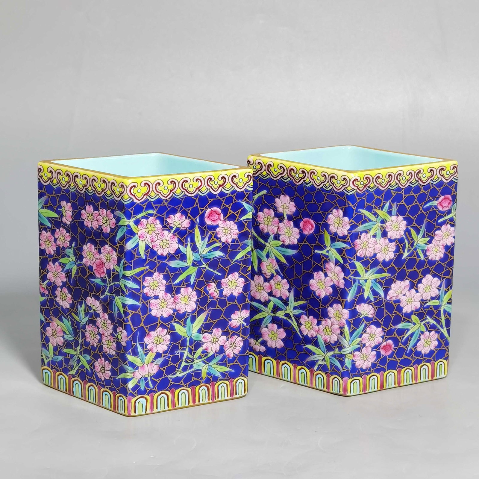 An Exquisite Chinese pastel blue ground with golden plum and bamboo pattern prismatic pen holder: Size: Height 8 cm - Width 5.3 cm |Materials: Porcelain |Style Dynasty: Qing dynasty |Inscription: Qianlong Mark |Object: pen holder